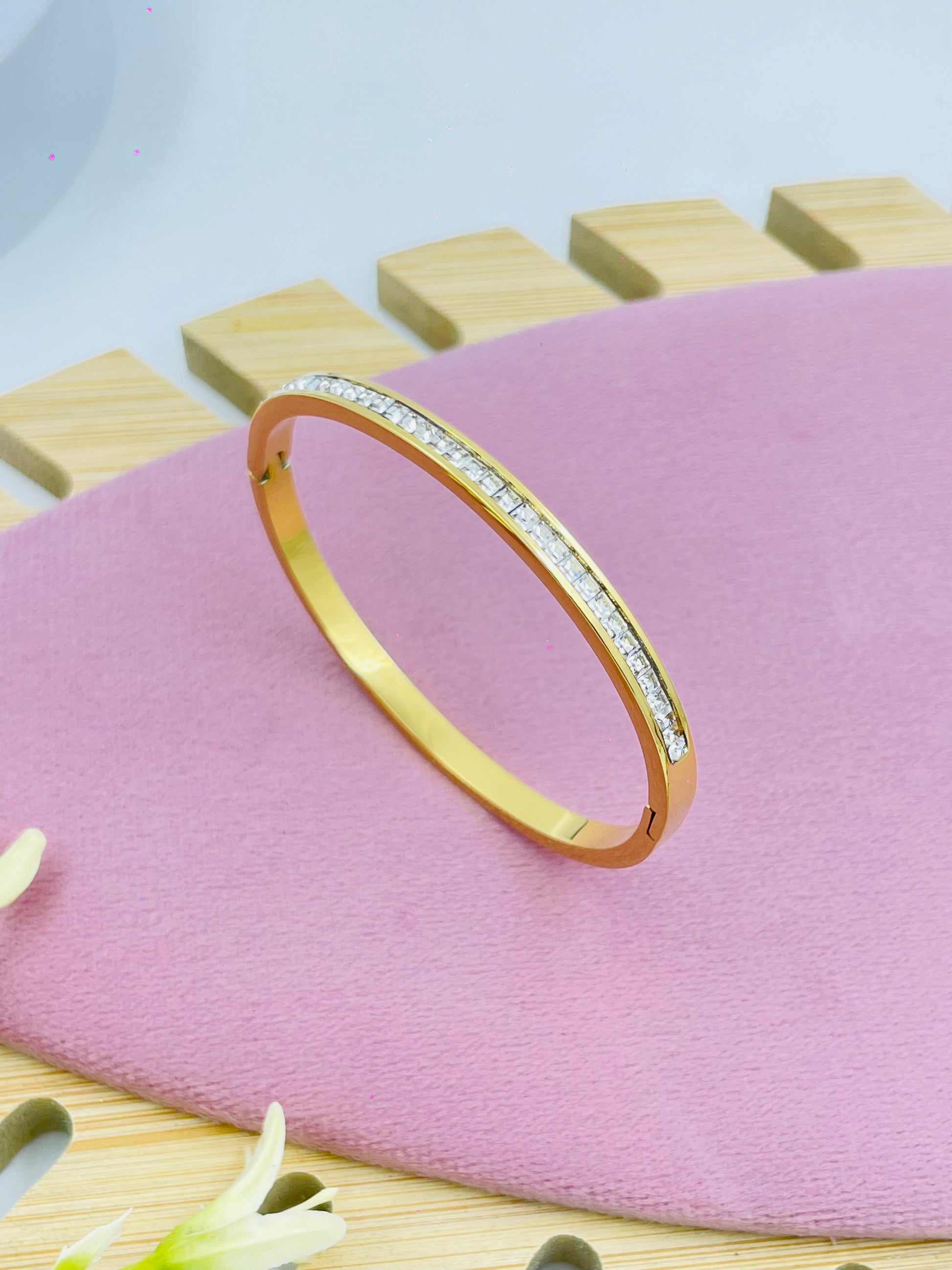 Elegant Gold Bangle with Diamond Accents