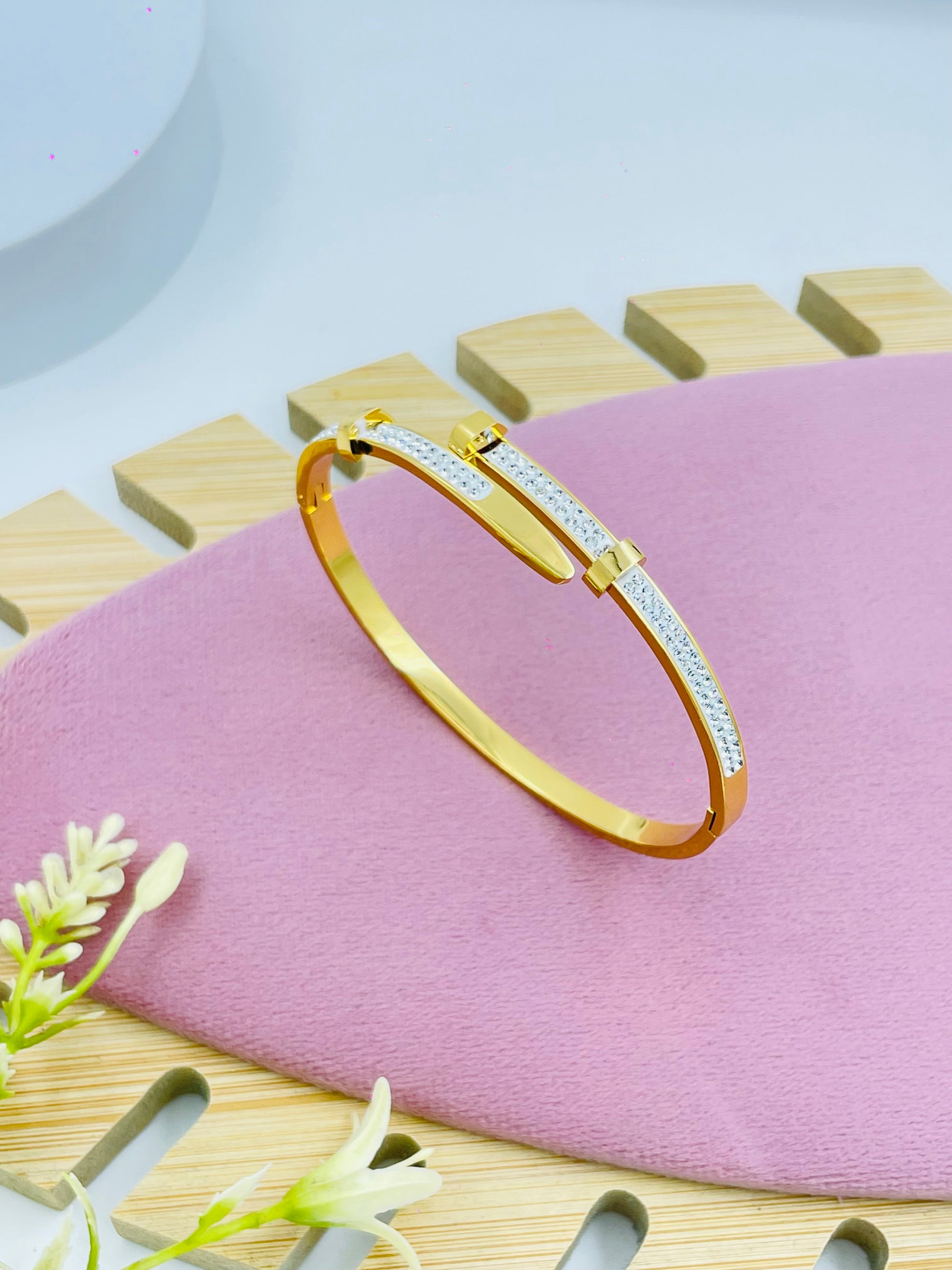 Elegant Gold and Diamond Bangle Bracelet