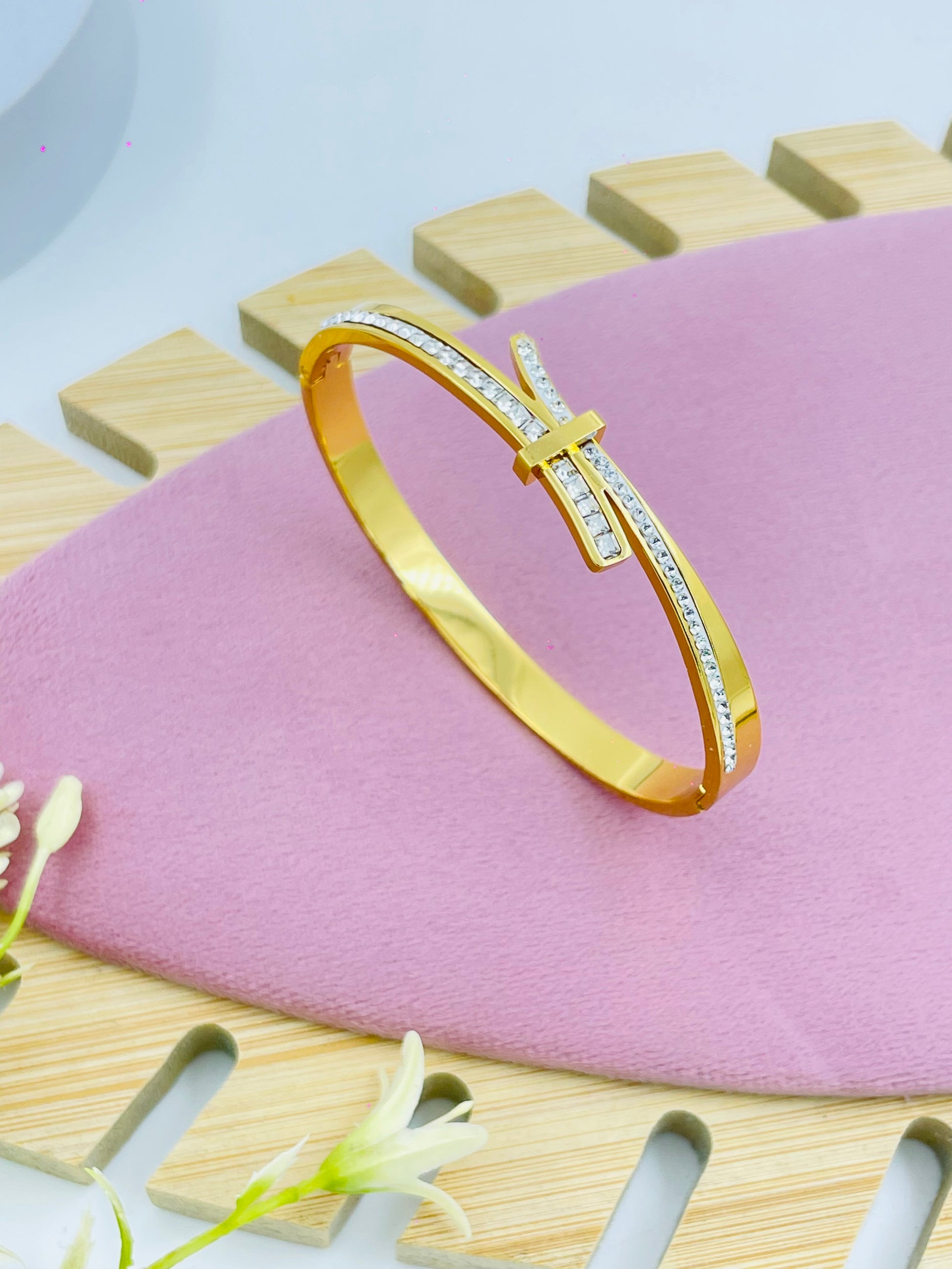 Elegant Gold Plated Crossover Bracelet with Rhinestones