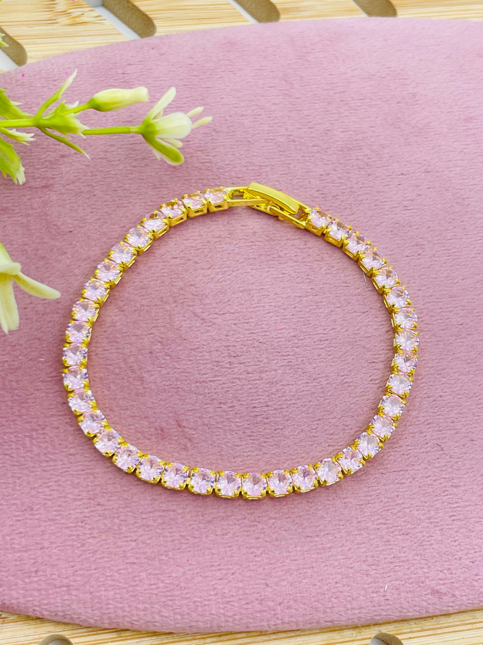 Elegant Gold and Pink Tennis Bracelet