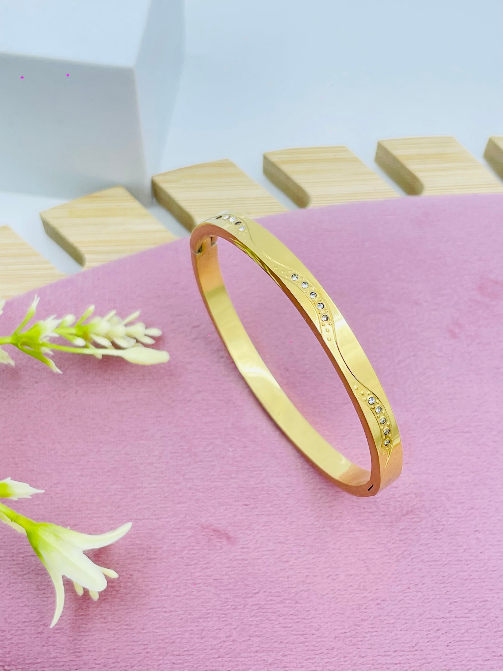 Elegant Gold Bangle with Diamond Accents  Perfect for Any Occasion