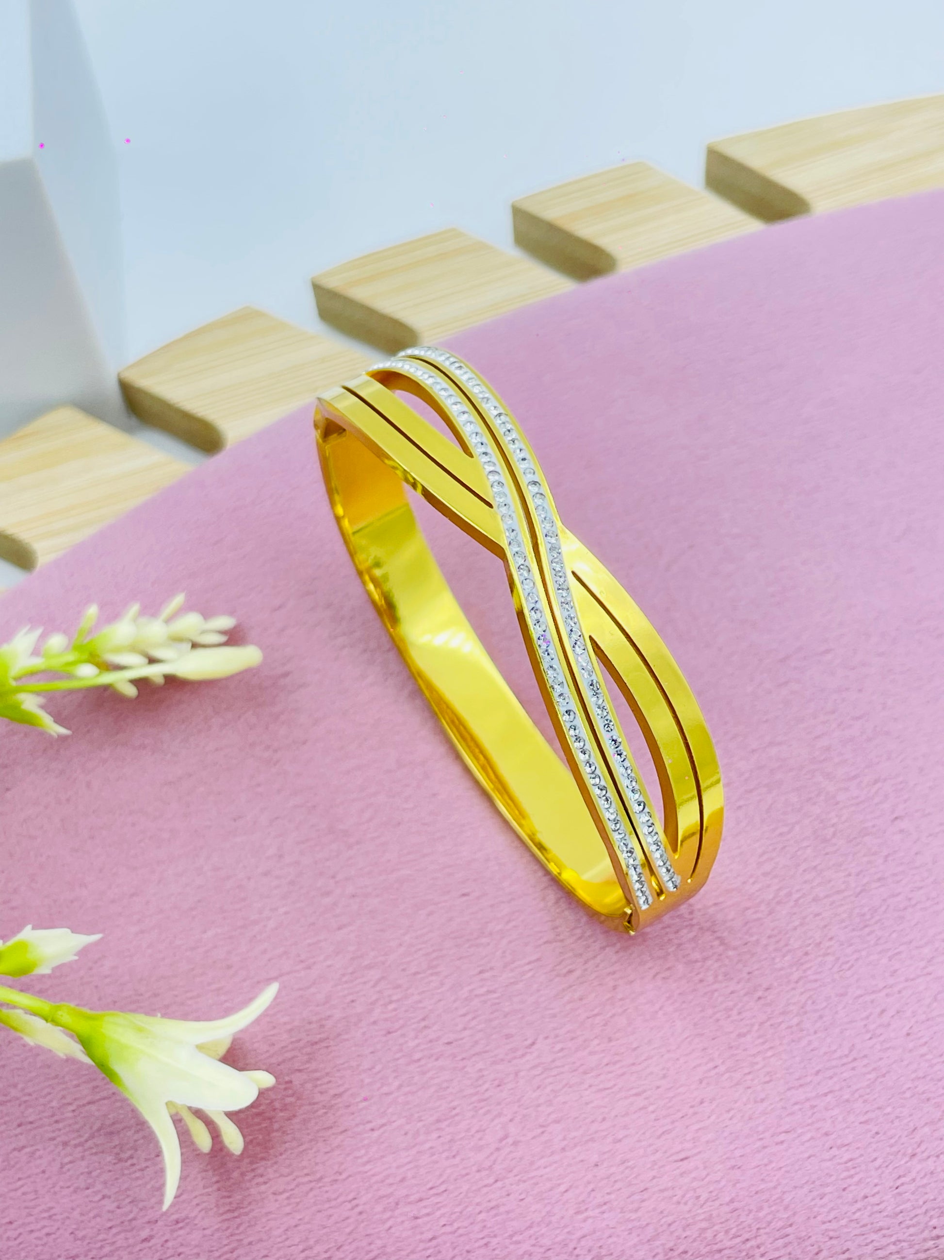 Elegant Gold and Silver Crossover Bangle  Stylish Jewelry