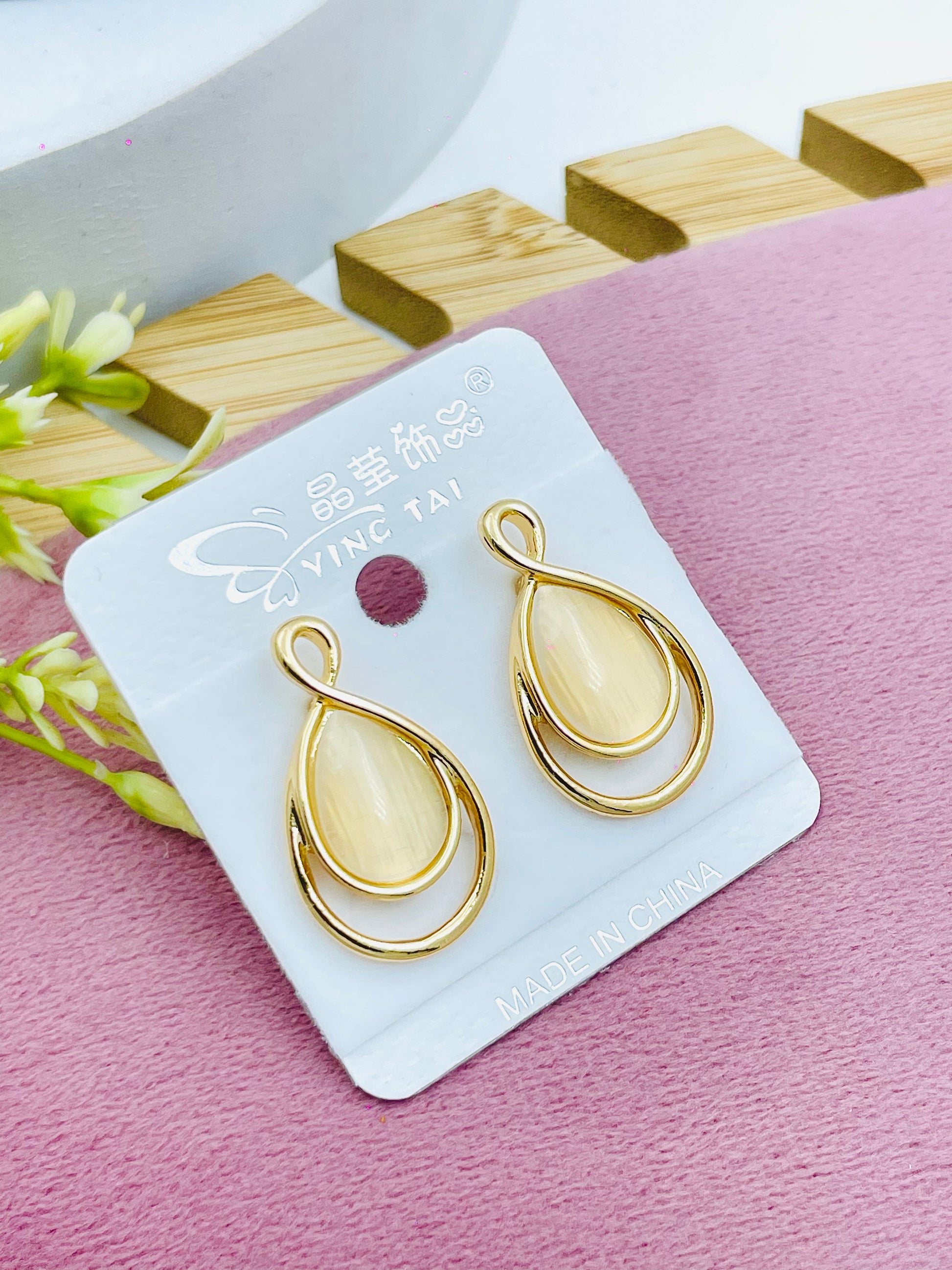 Elegant Teardrop Gold and Cream Earrings