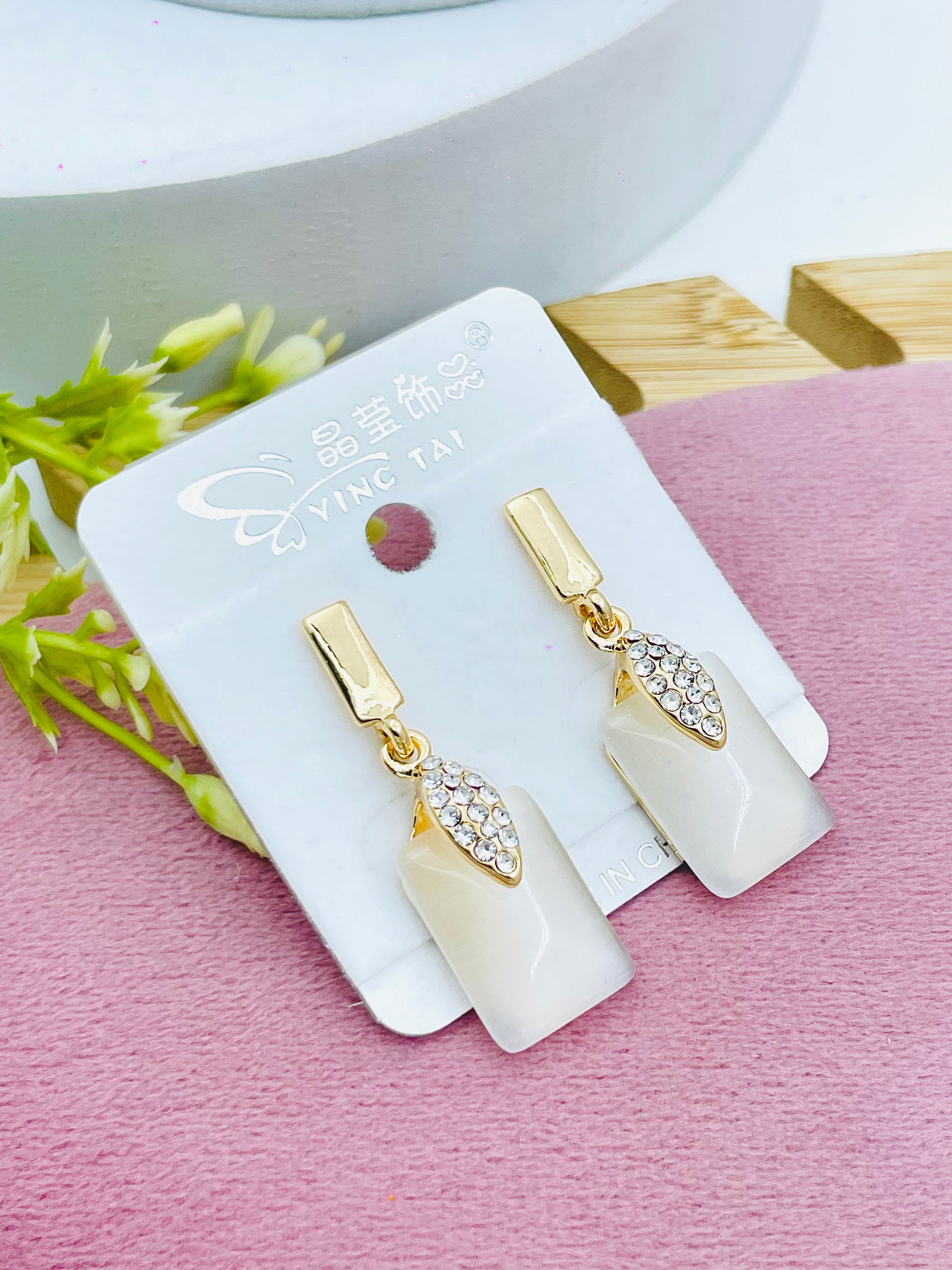 Elegant Yinc Tai White Stone Earrings with Crystal Accents