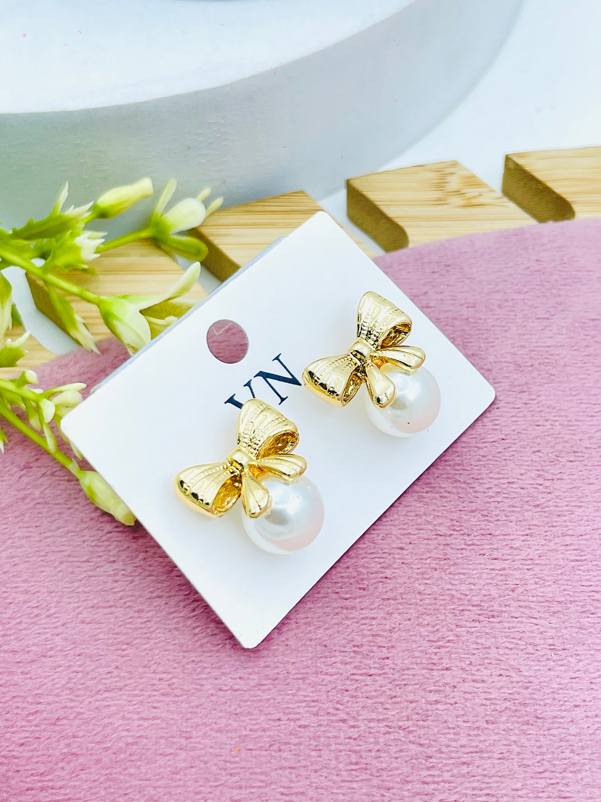 Elegant Gold Bow with Pearl Earrings