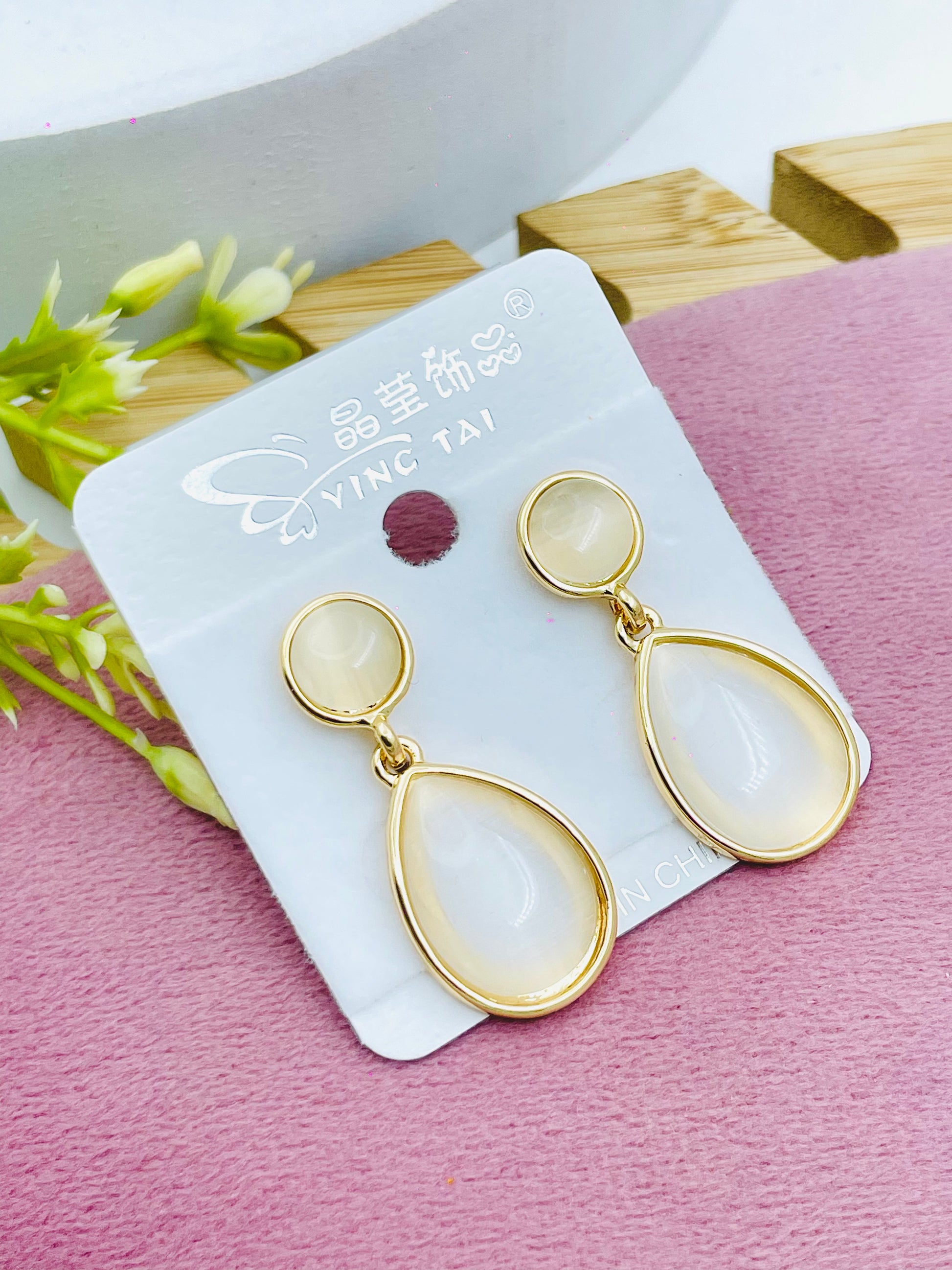 Elegant Gold and White Teardrop Earrings