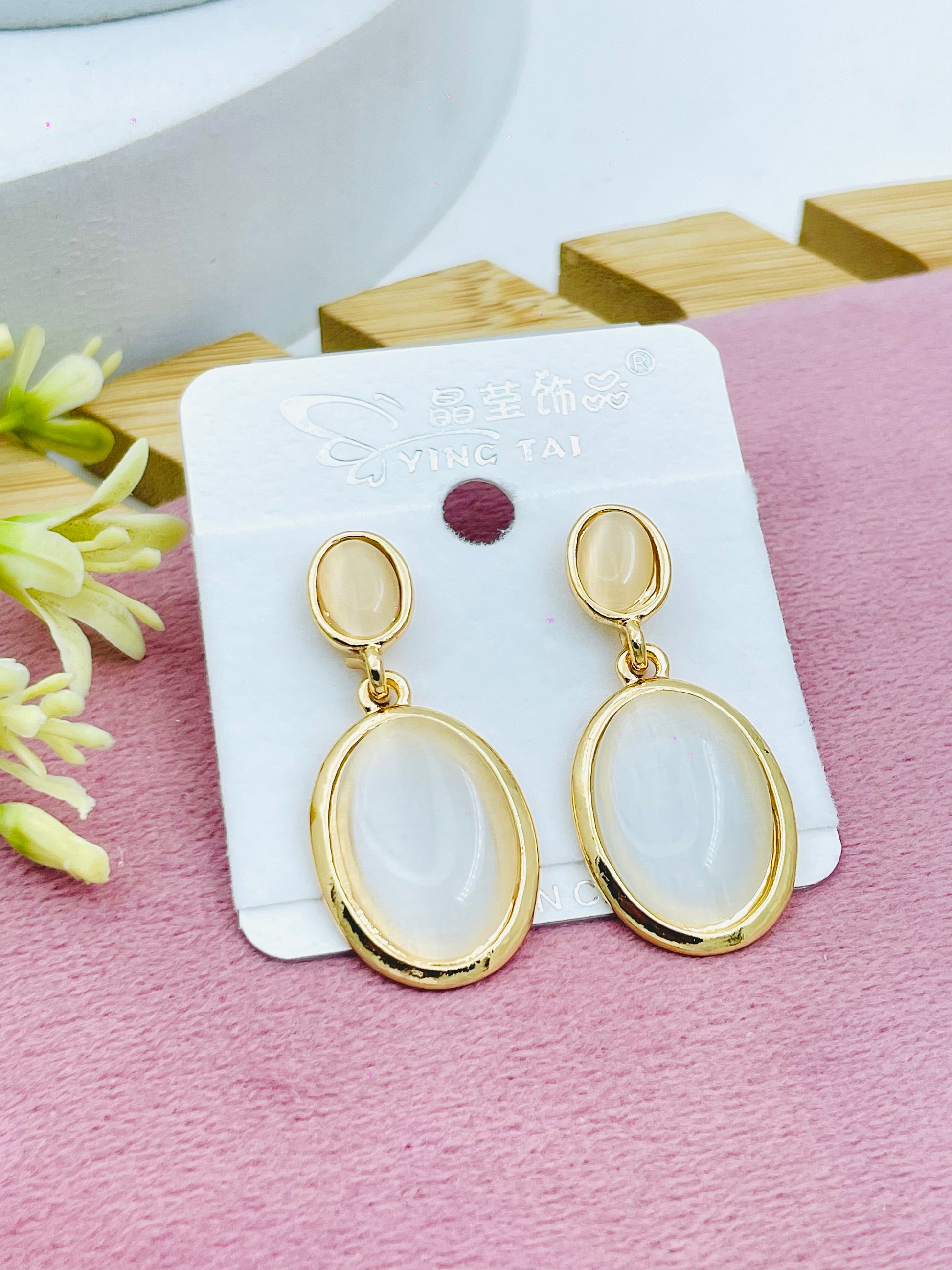 Elegant Gold Oval Earrings with White Gem  Stylish Accessory