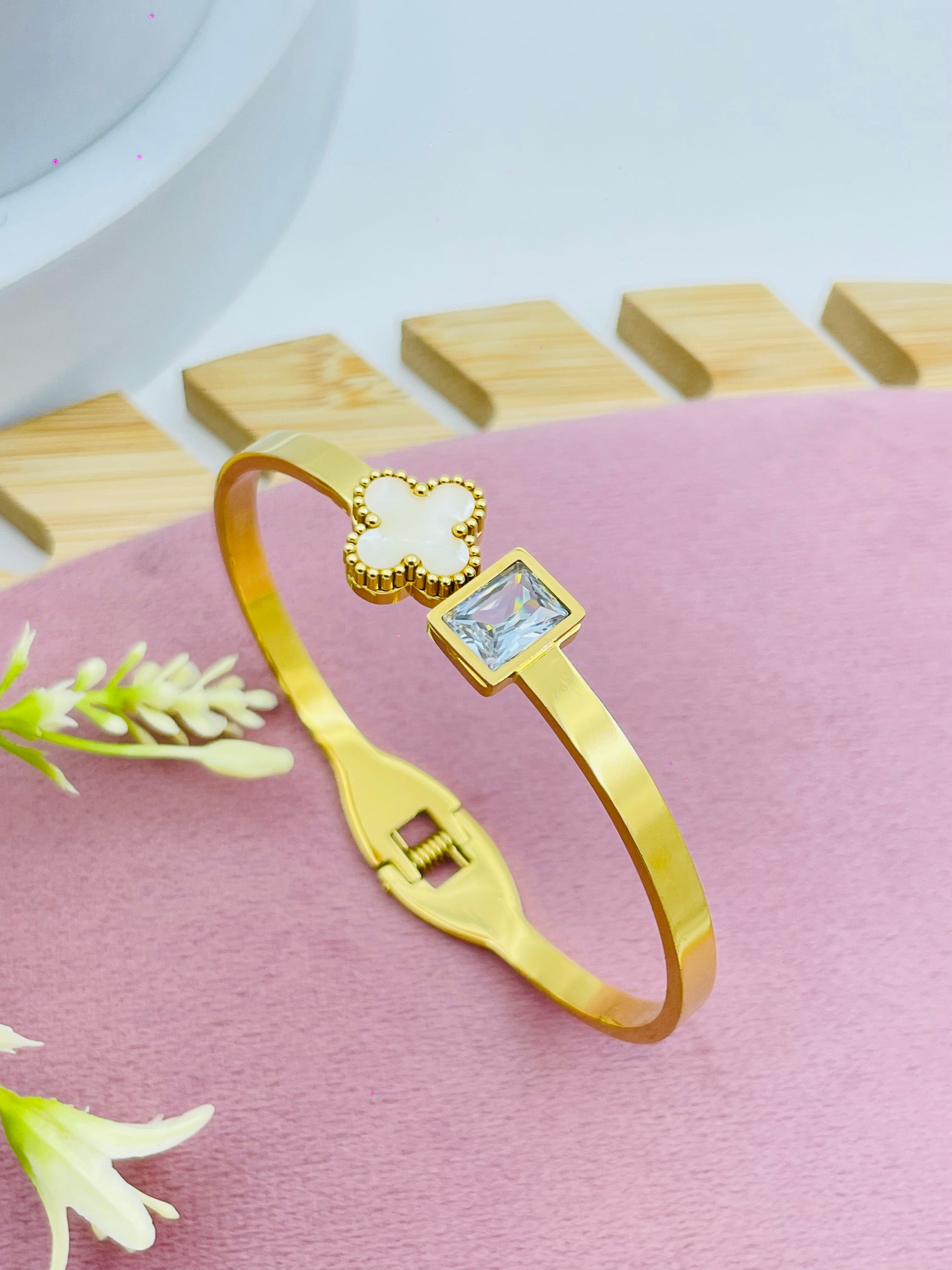 Elegant Gold Plated Bangle with White Enamel and Square Stone