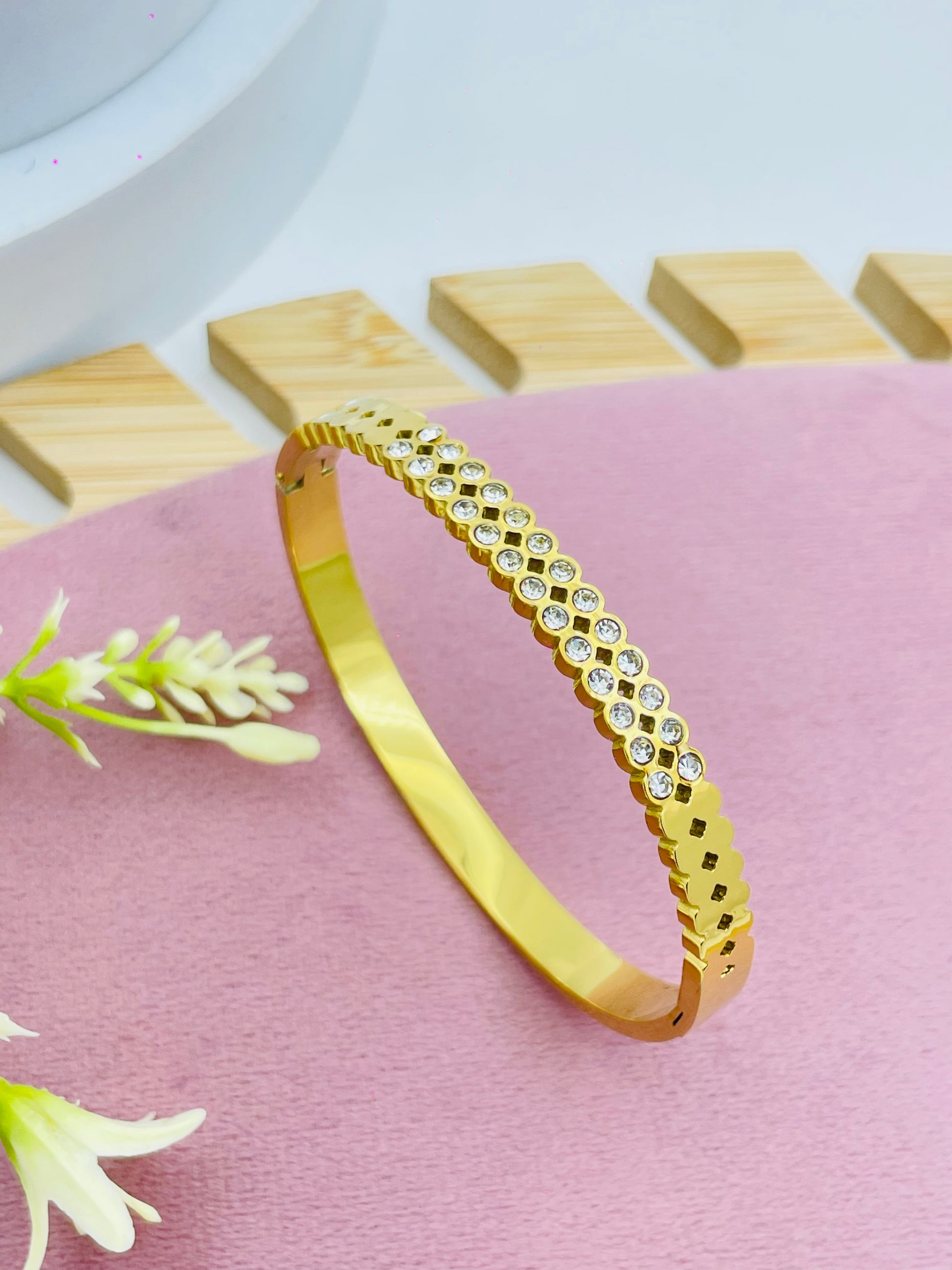 Elegant Gold and Diamond Bangle Bracelet