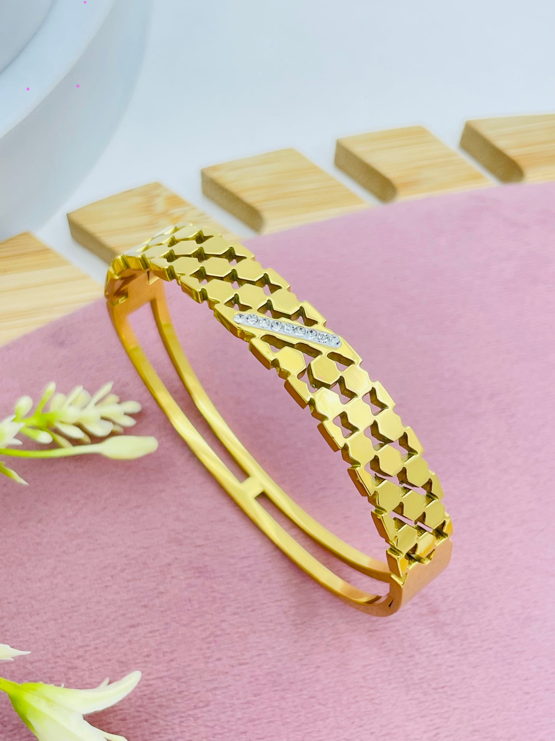 Elegant Gold Geometric Bangle with Diamond Accents