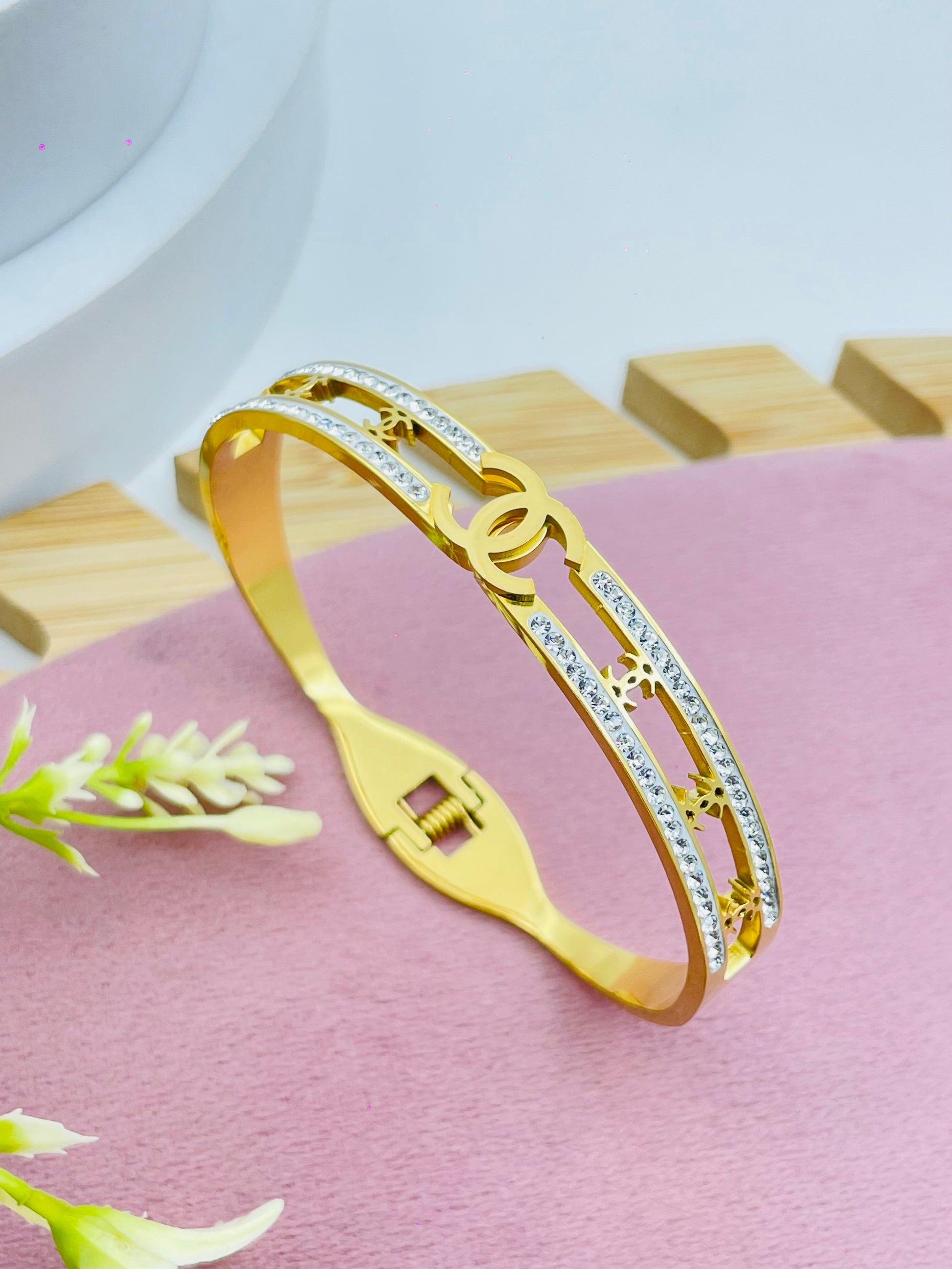 Stylish Gold and Silver Bracelet with Star Patterns