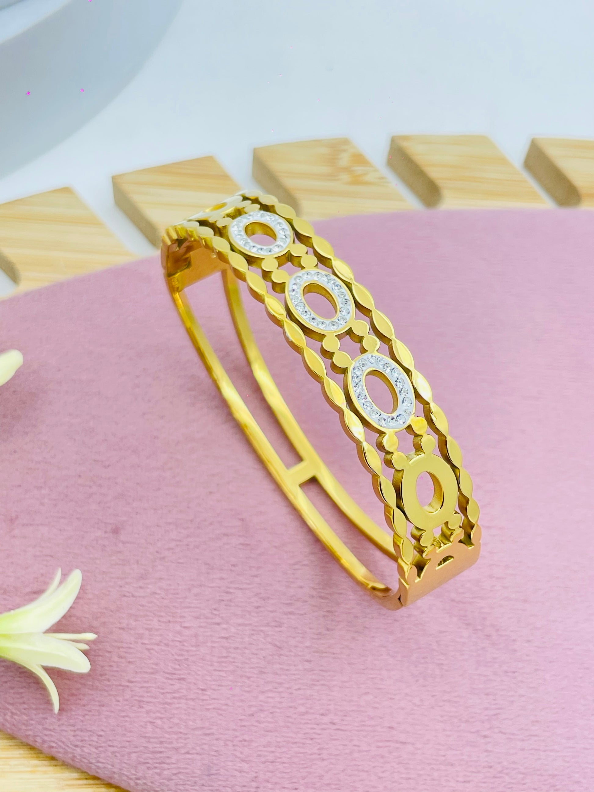Elegant Gold and Silver Circle Motif Bangle