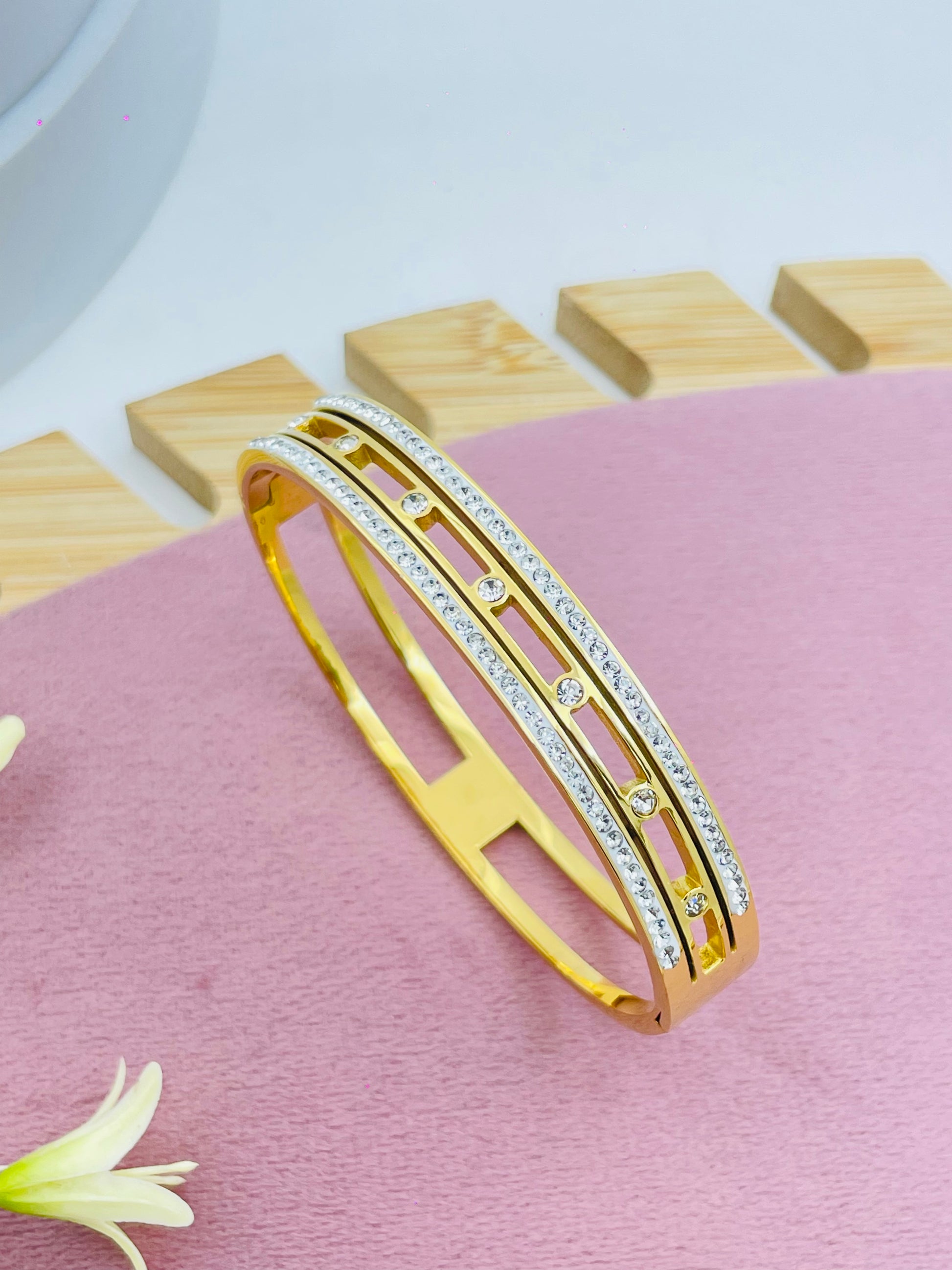 Elegant Gold and Diamond Bangle Bracelet