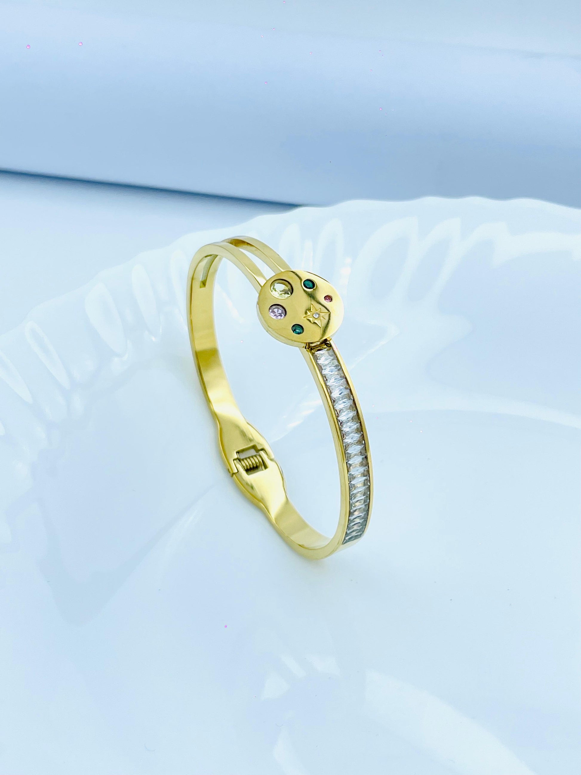 Stylish Anti Tarnish Gold Kada with Multicolor Stones & Crystal Line