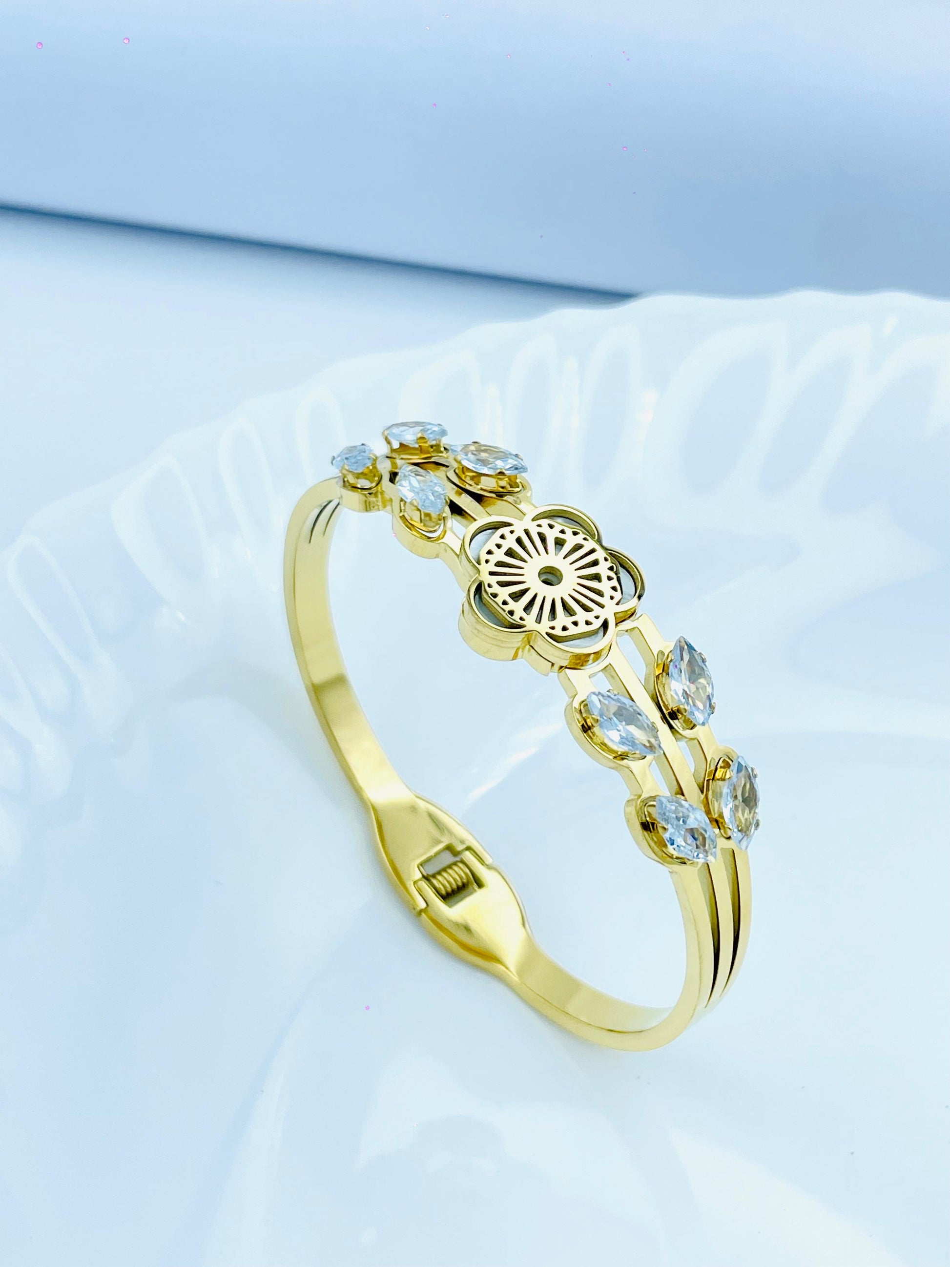 Gold Bangle with Floral Center & Marquise-Cut Crystals