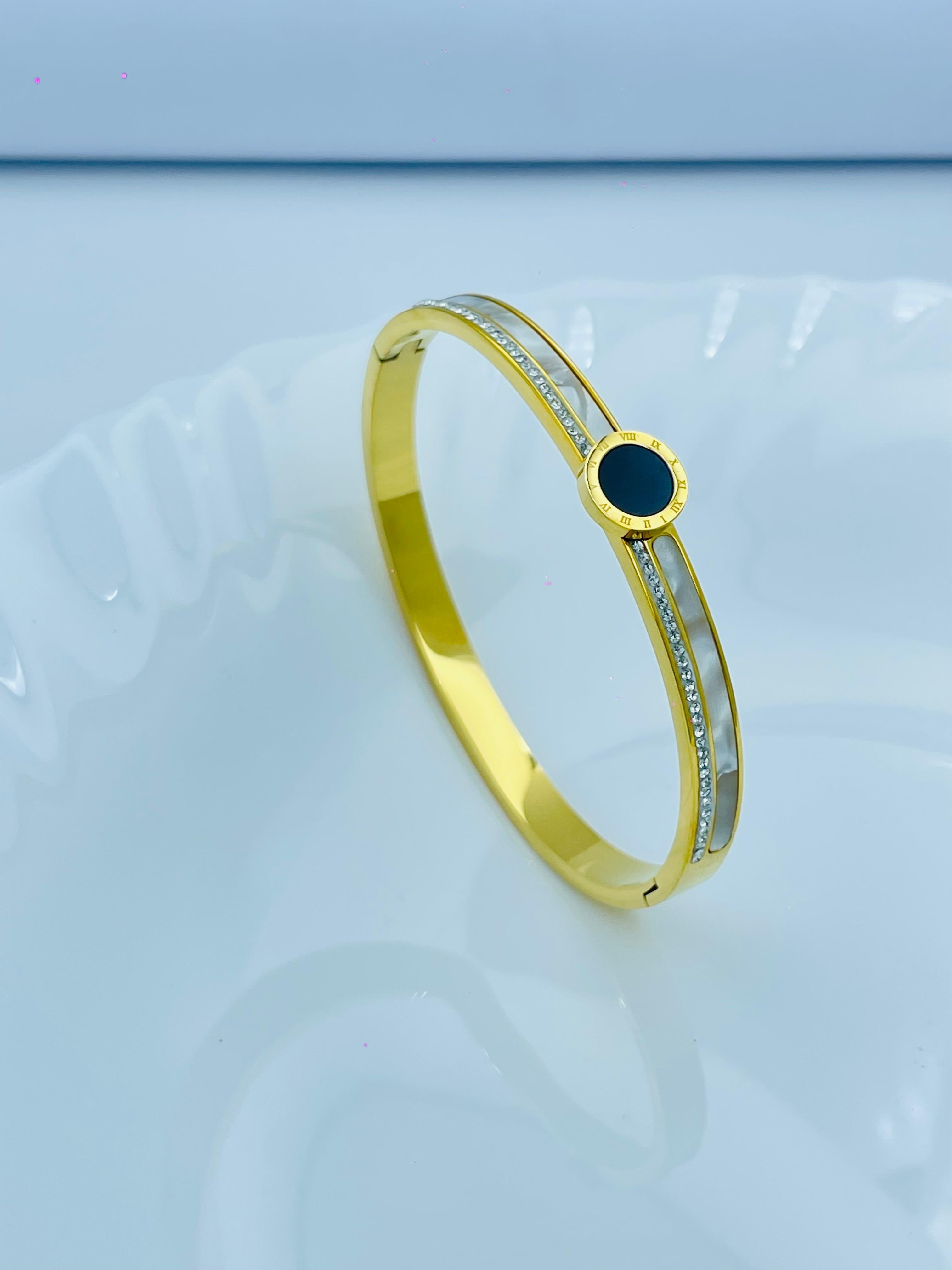 Gold Inlay Crystal Gold Bracelet with Black Roman Dial Center & Crystal Inlay | Sleek & A ...