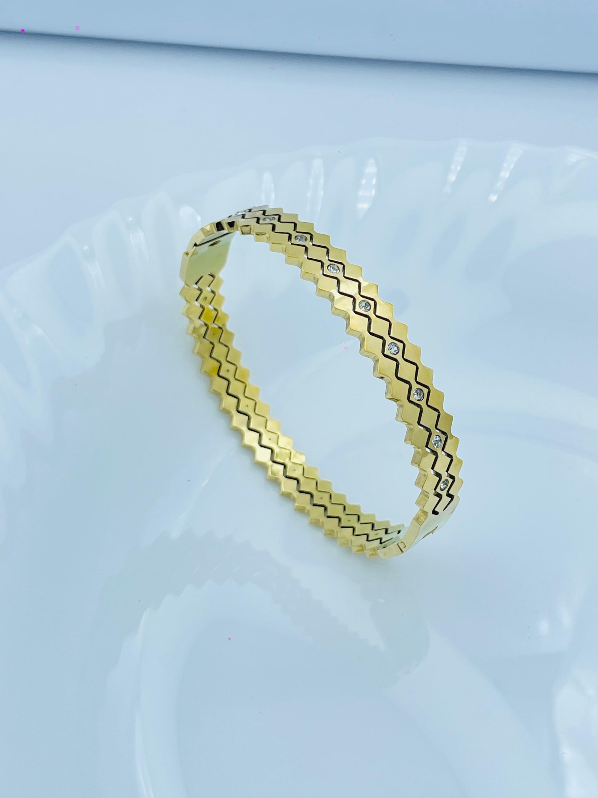 Gold Plated Zigzag Bangle with Stone Detailing | Elegant Designer Bracelet