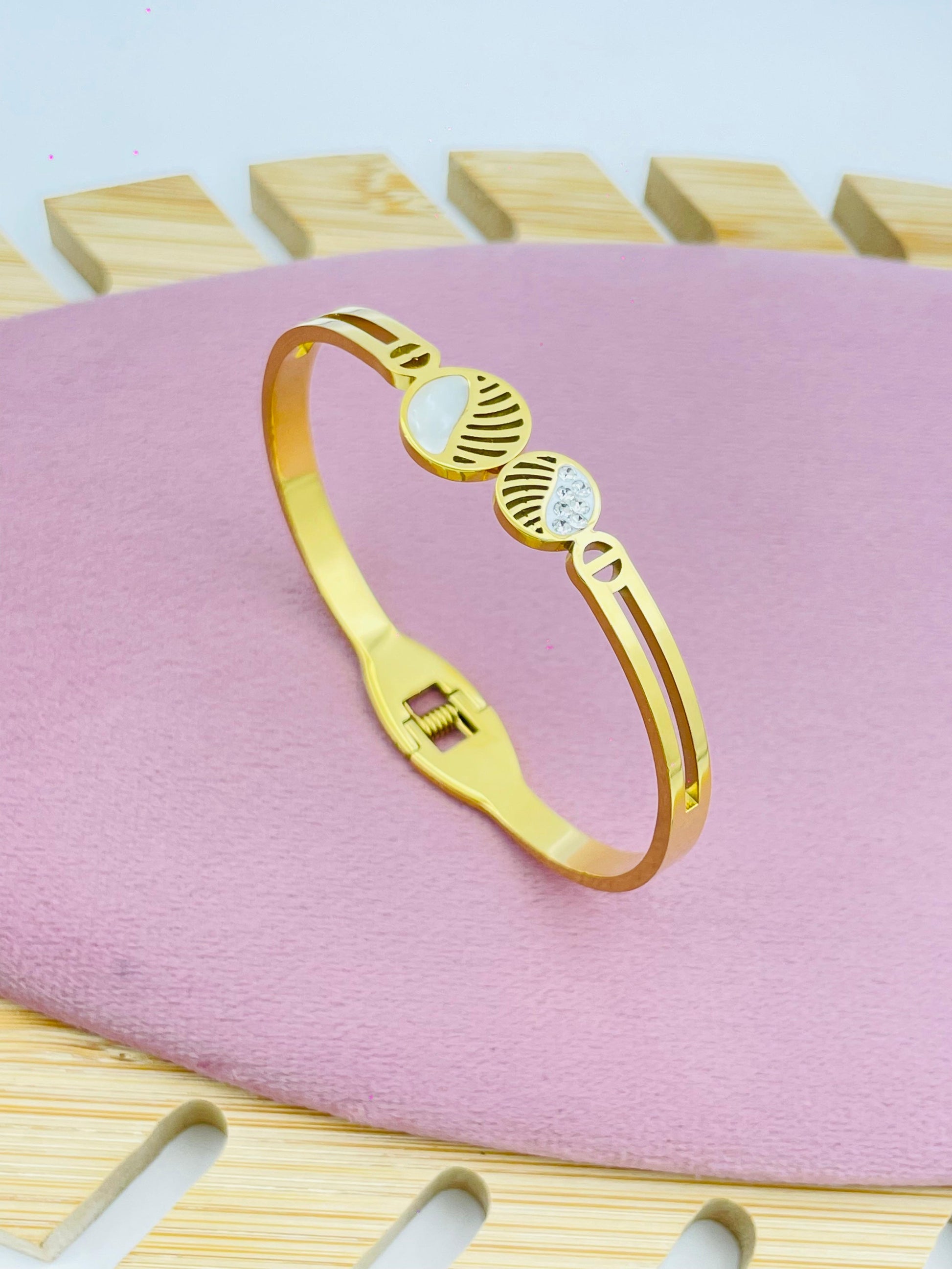 Modern Bracelet with Circular Design and Crystals