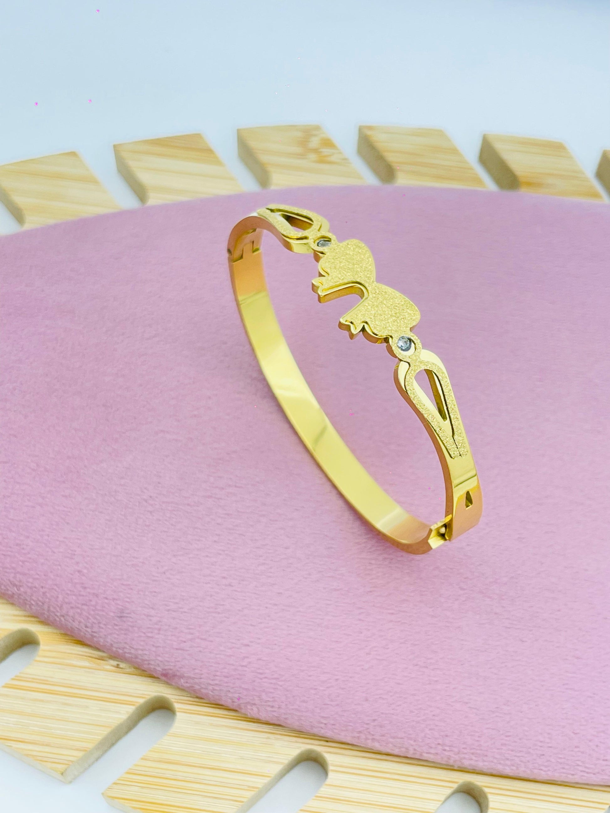 Gold Bracelet with Butterfly Design and Sparkling Accents