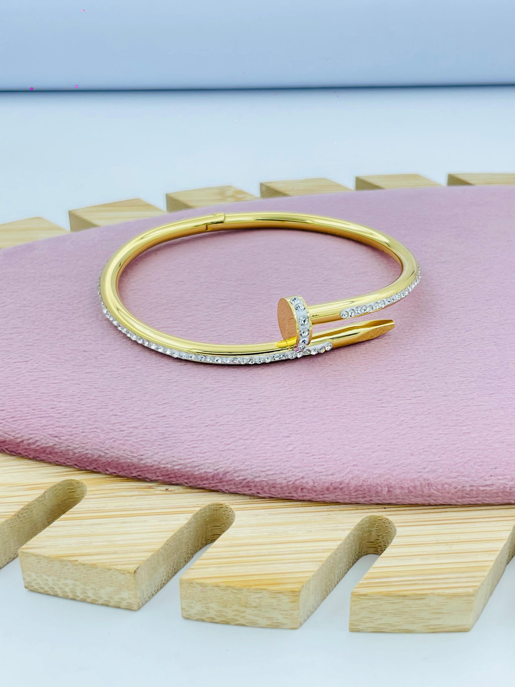 Gold Bracelet with Crystal Detailing and Modern Design