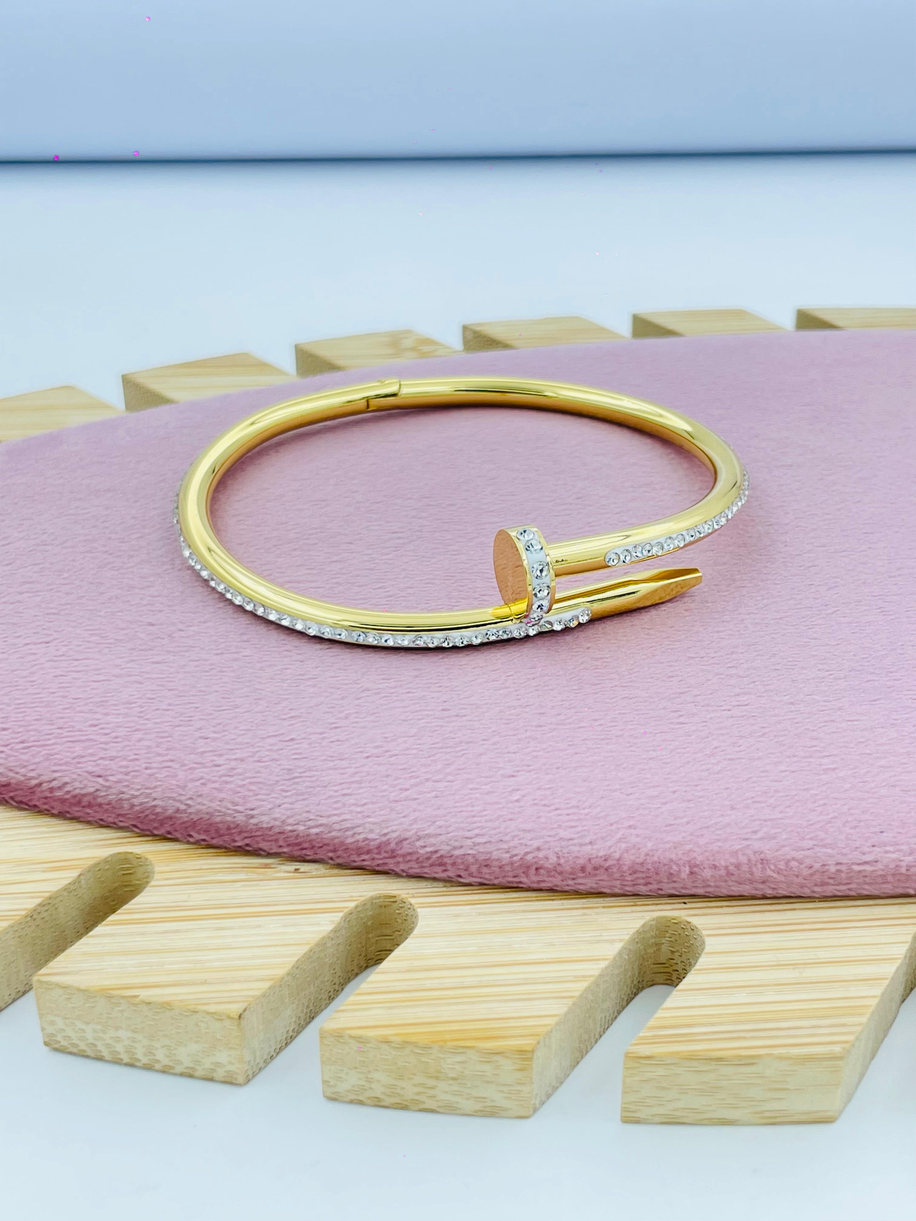 Gold Bracelet with Crystal Detailing and Modern Design