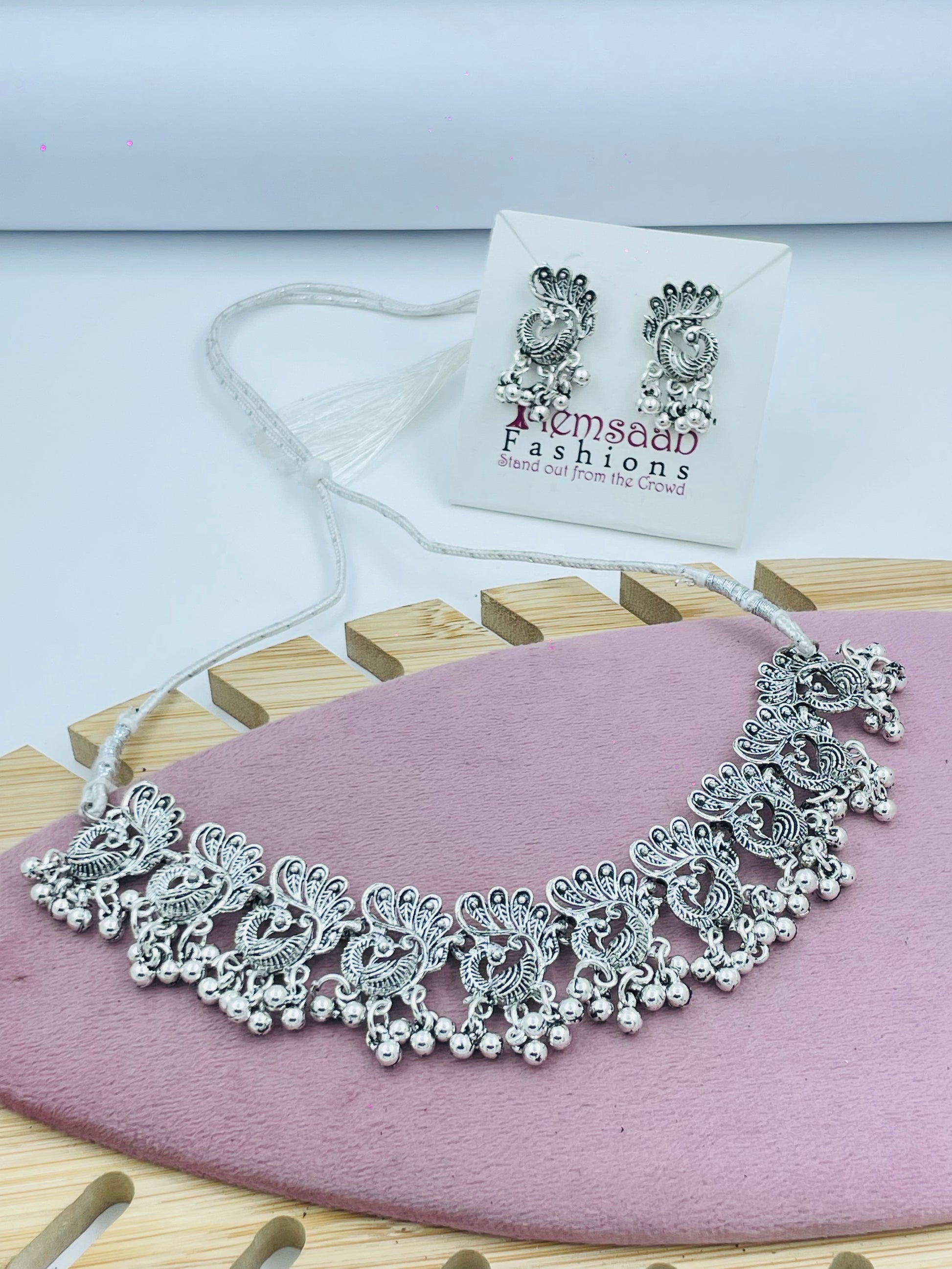 Elegant Silver Peacock Motif Necklace and Earring Set