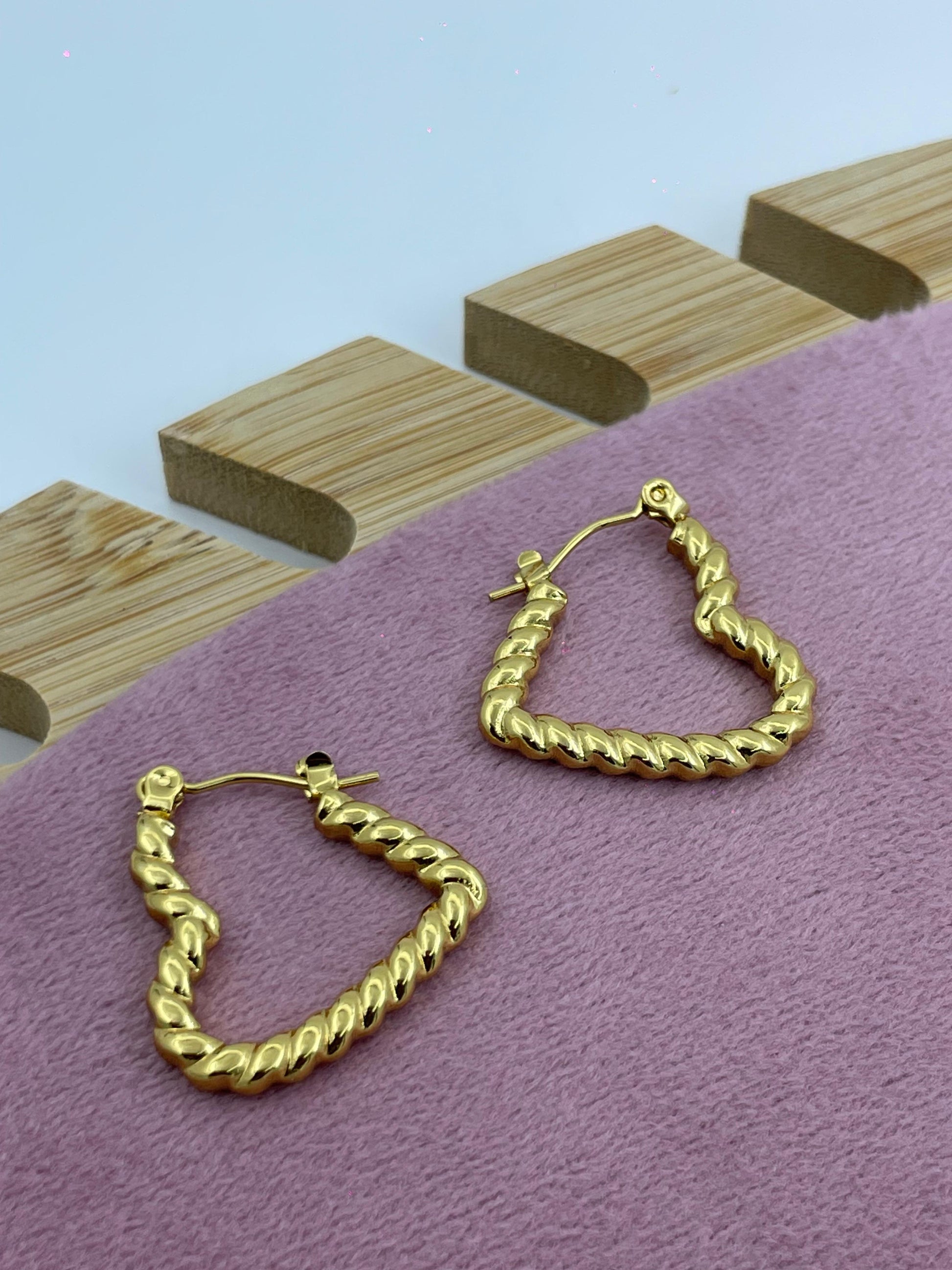 Twisted Heart Gold Hoop Earrings – Bold & Romantic Design
