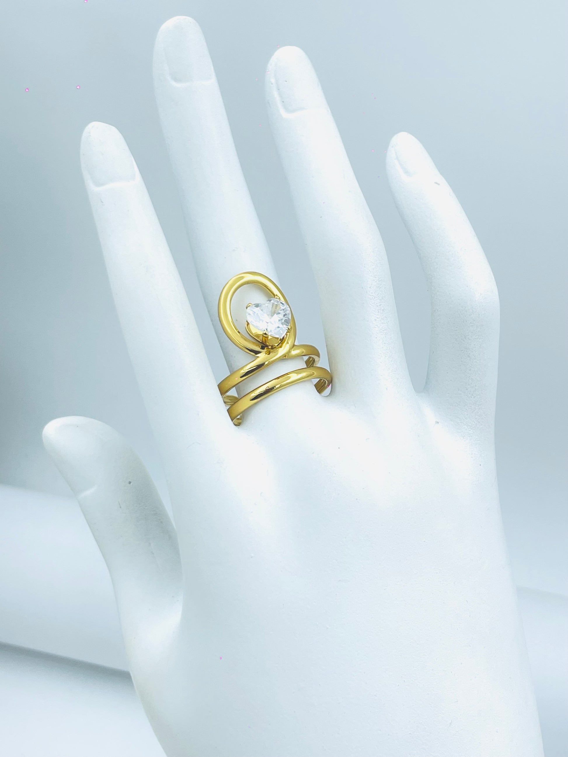 Elegant Gold Spiral Solitaire Ring