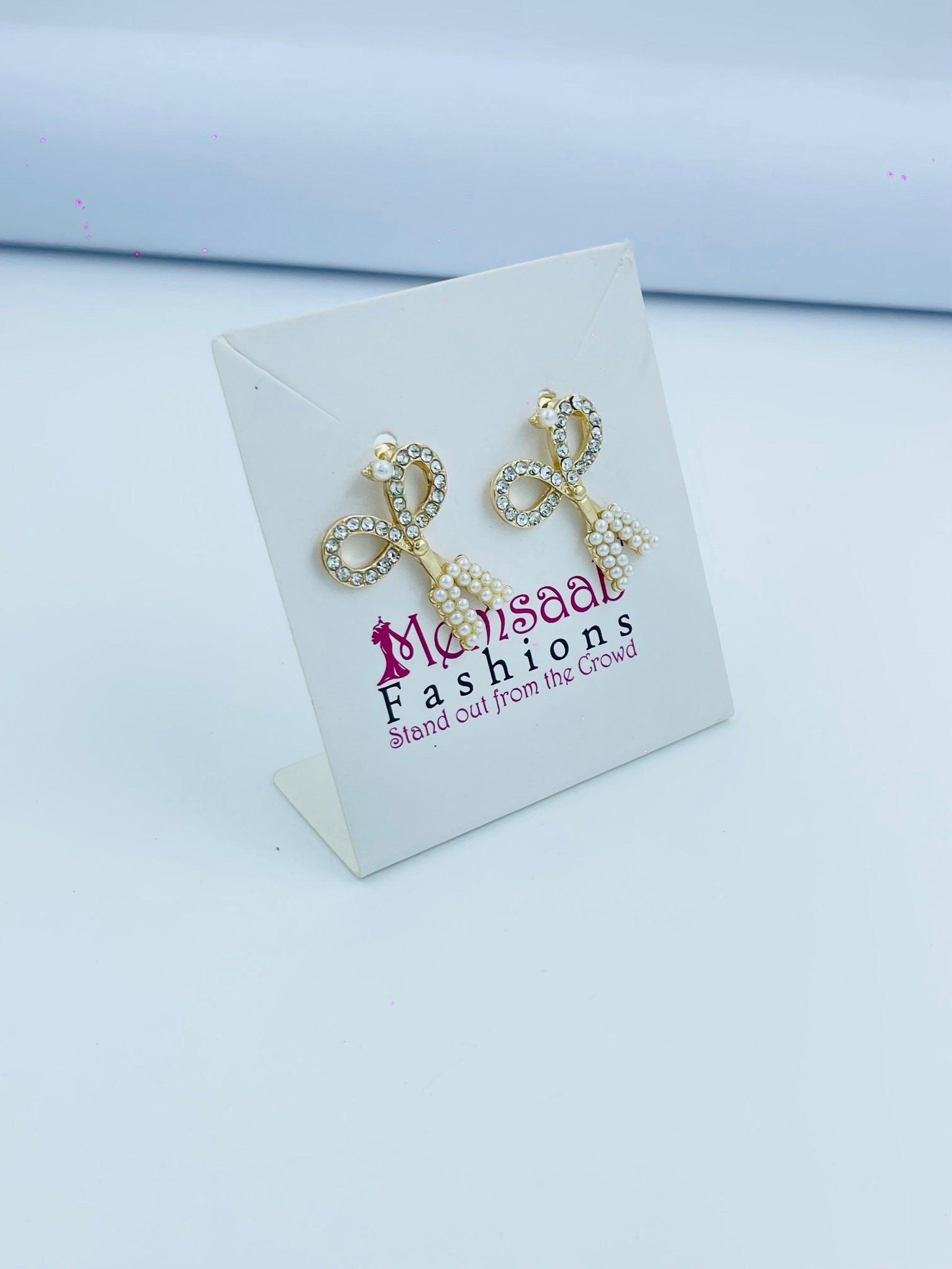 Gold Bow Pearl Drop Earrings with Crystal Detailing