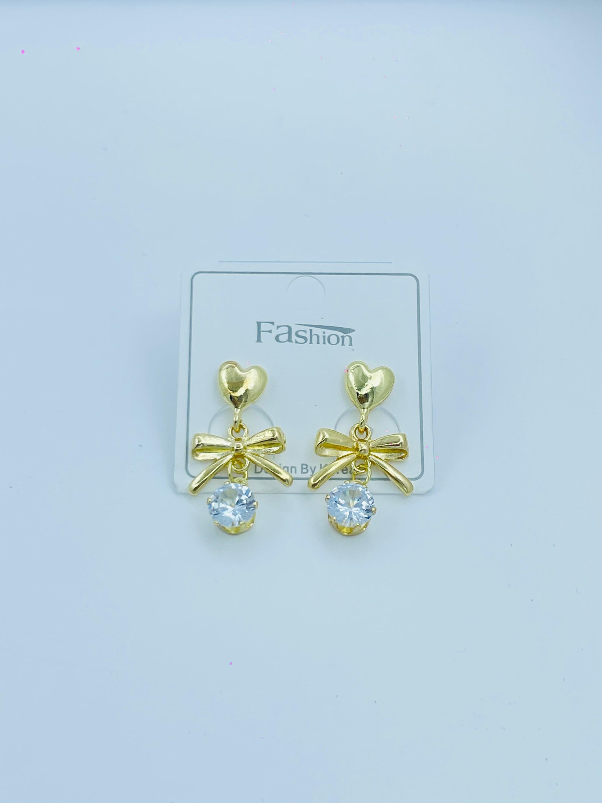 Gold Heart & Bow Drop Earrings with Crystal Charm – Cute & Elegant Jewelry