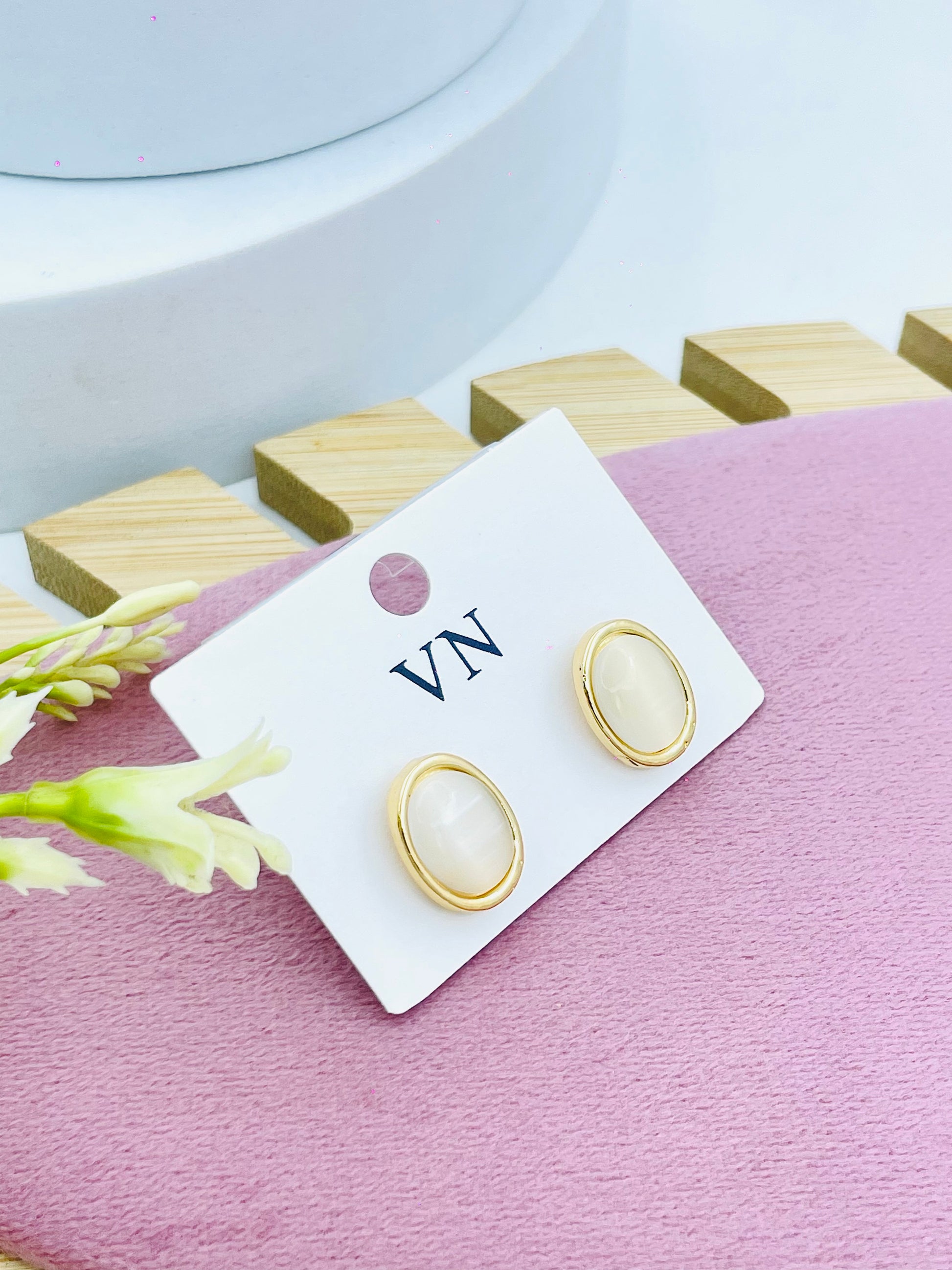 Elegant Oval GoldTrimmed Cream Earrings