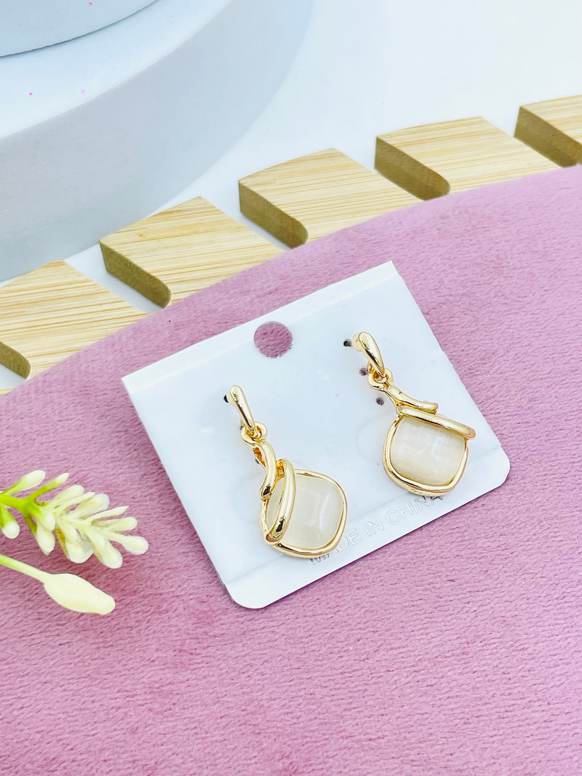 Elegant GoldTone Drop Earrings with White Stone