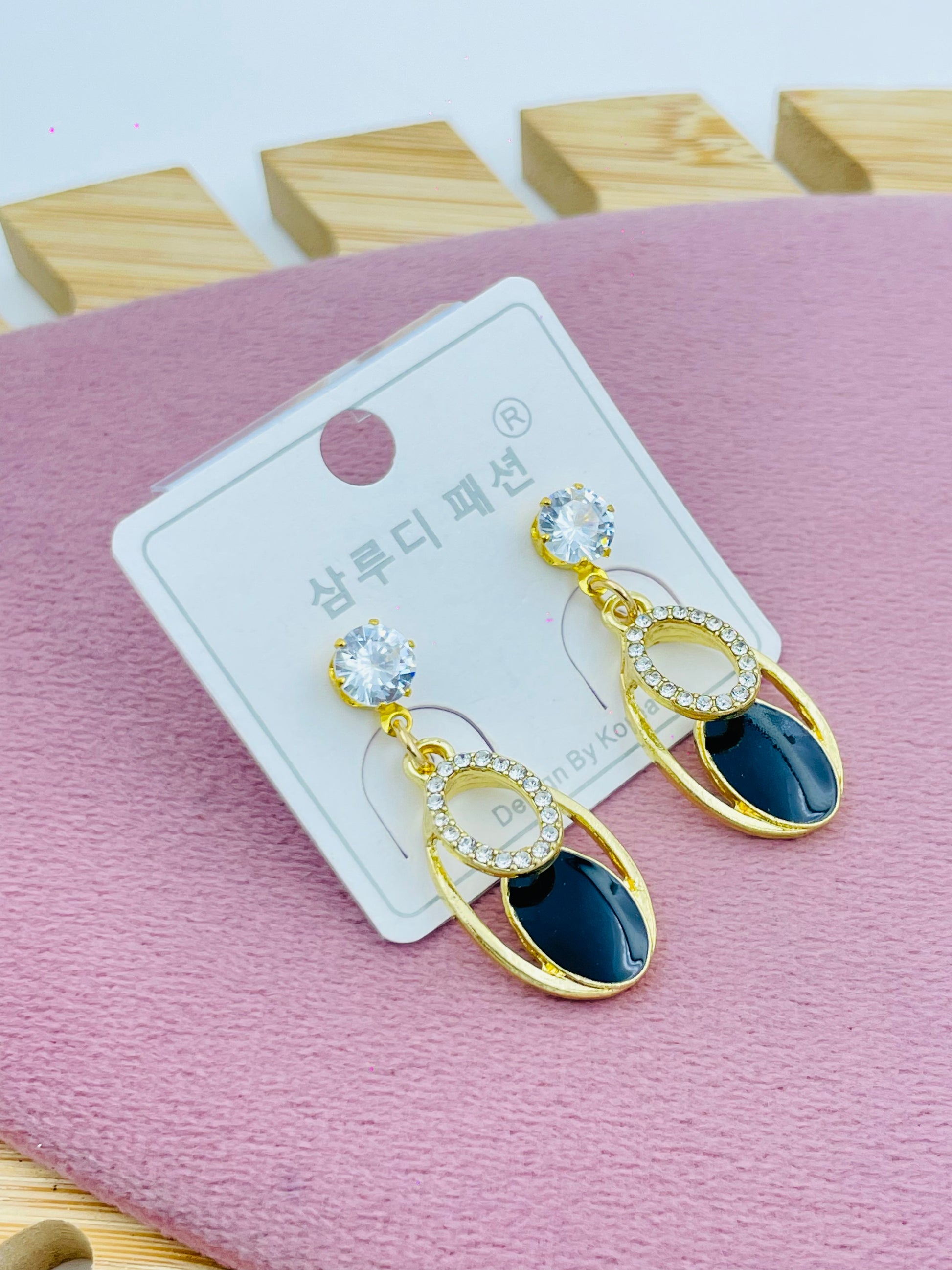 Elegant Gold and Black Dangle Earrings with Crystal Accents