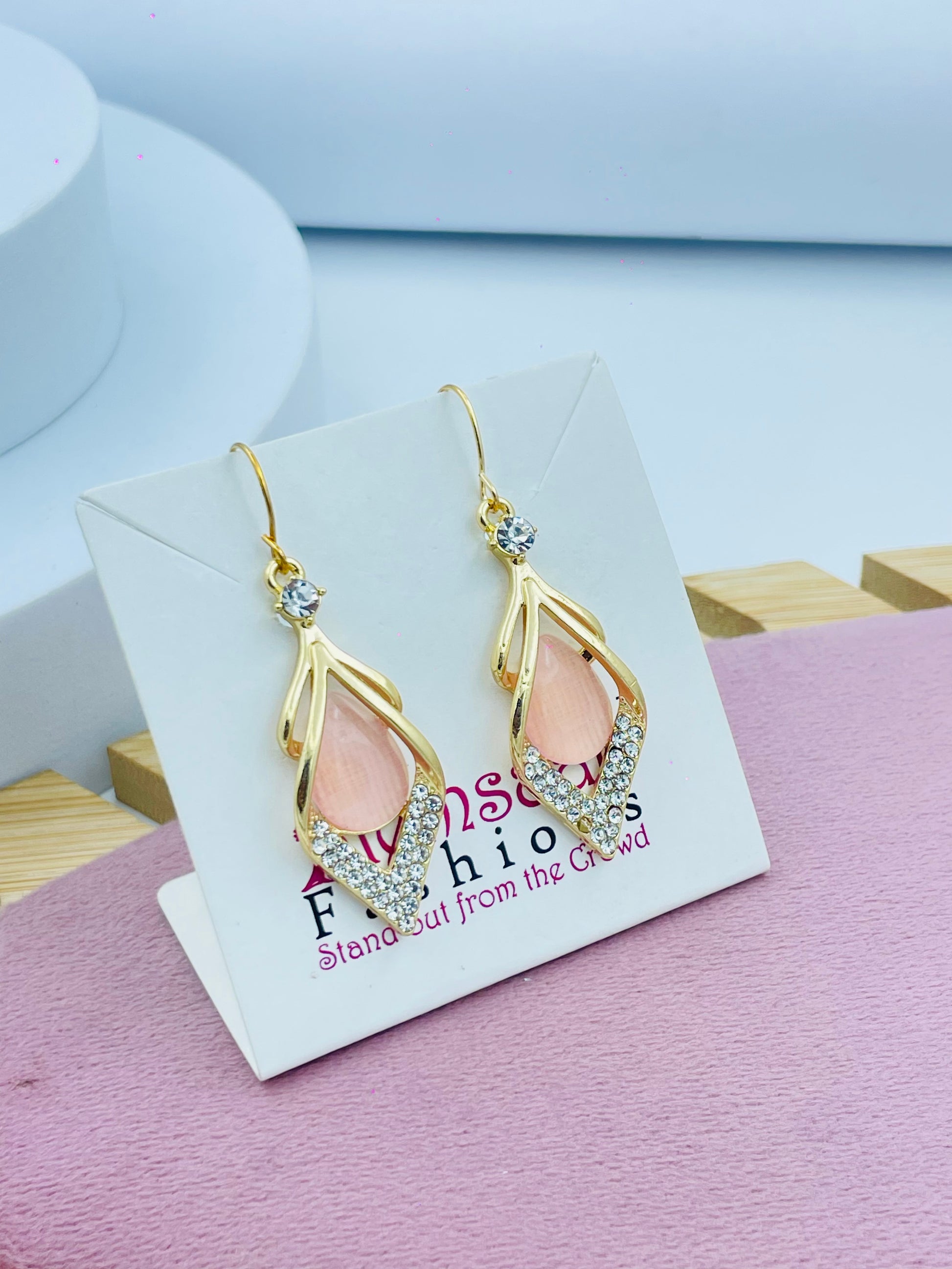 Elegant GoldTone Teardrop Earrings with Pink Gemstone