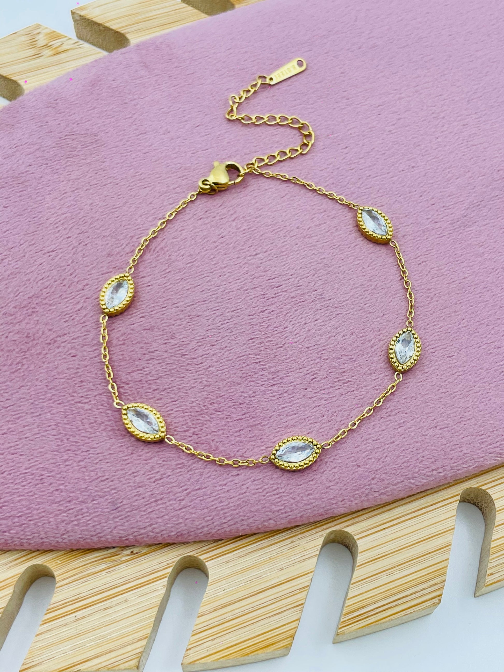 Elegant Gold Chain Bracelet with Sparkling Oval Gemstones