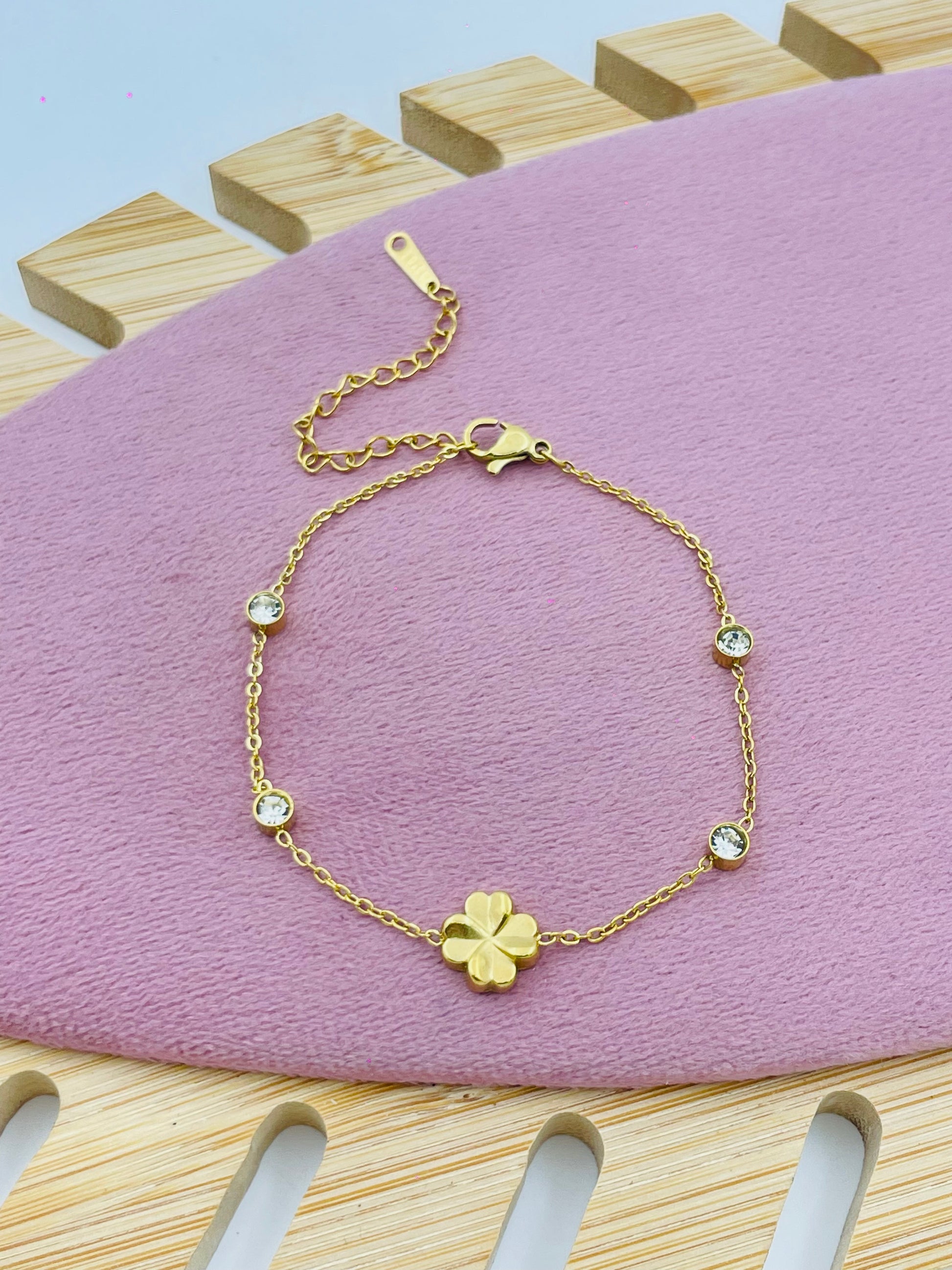 Elegant Gold Clover Charm Bracelet with Crystal Accents