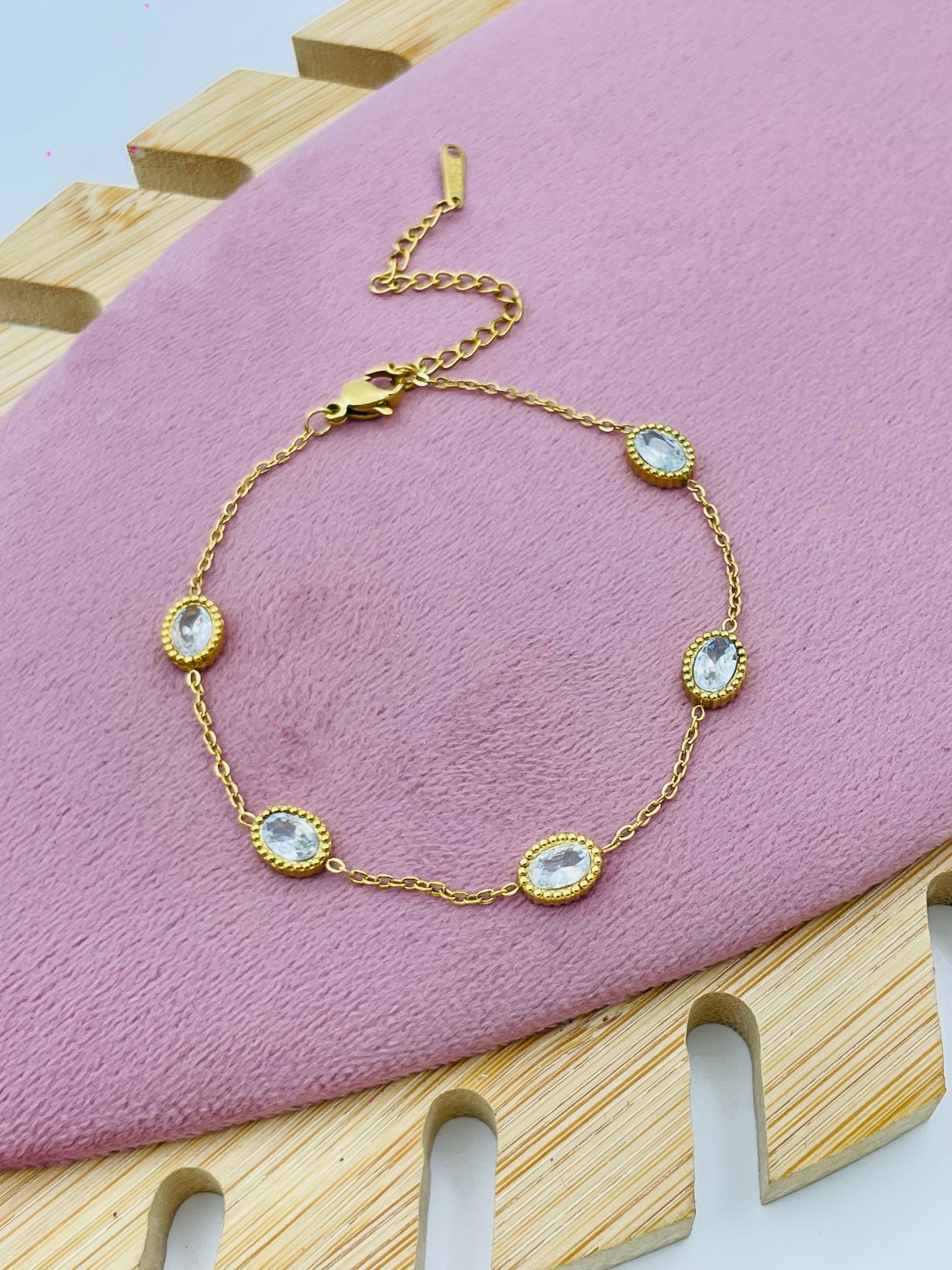 Elegant Gold Chain Bracelet with Sparkling Oval Gemstones