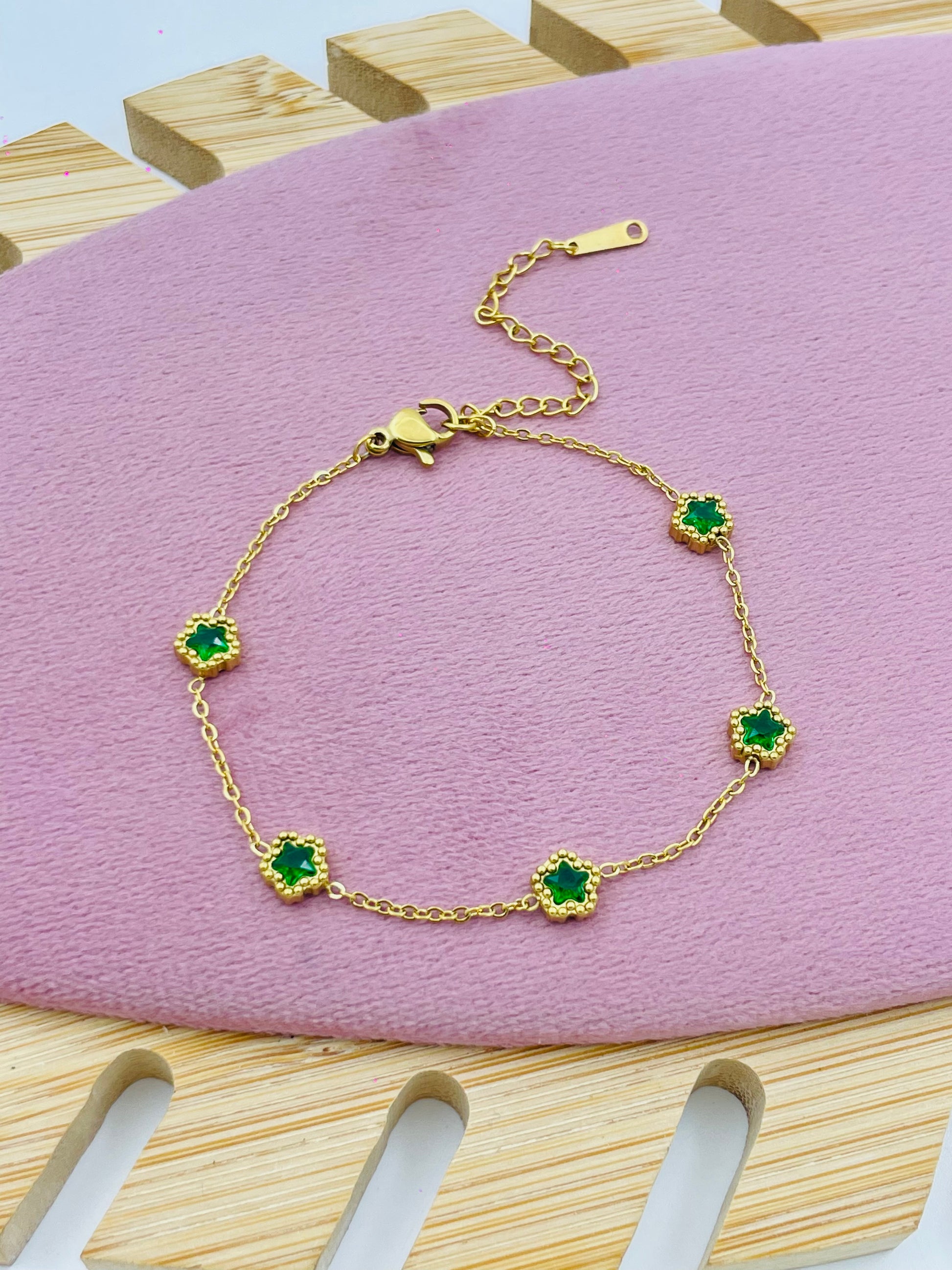 Elegant Gold Bracelet with Green Gemstones