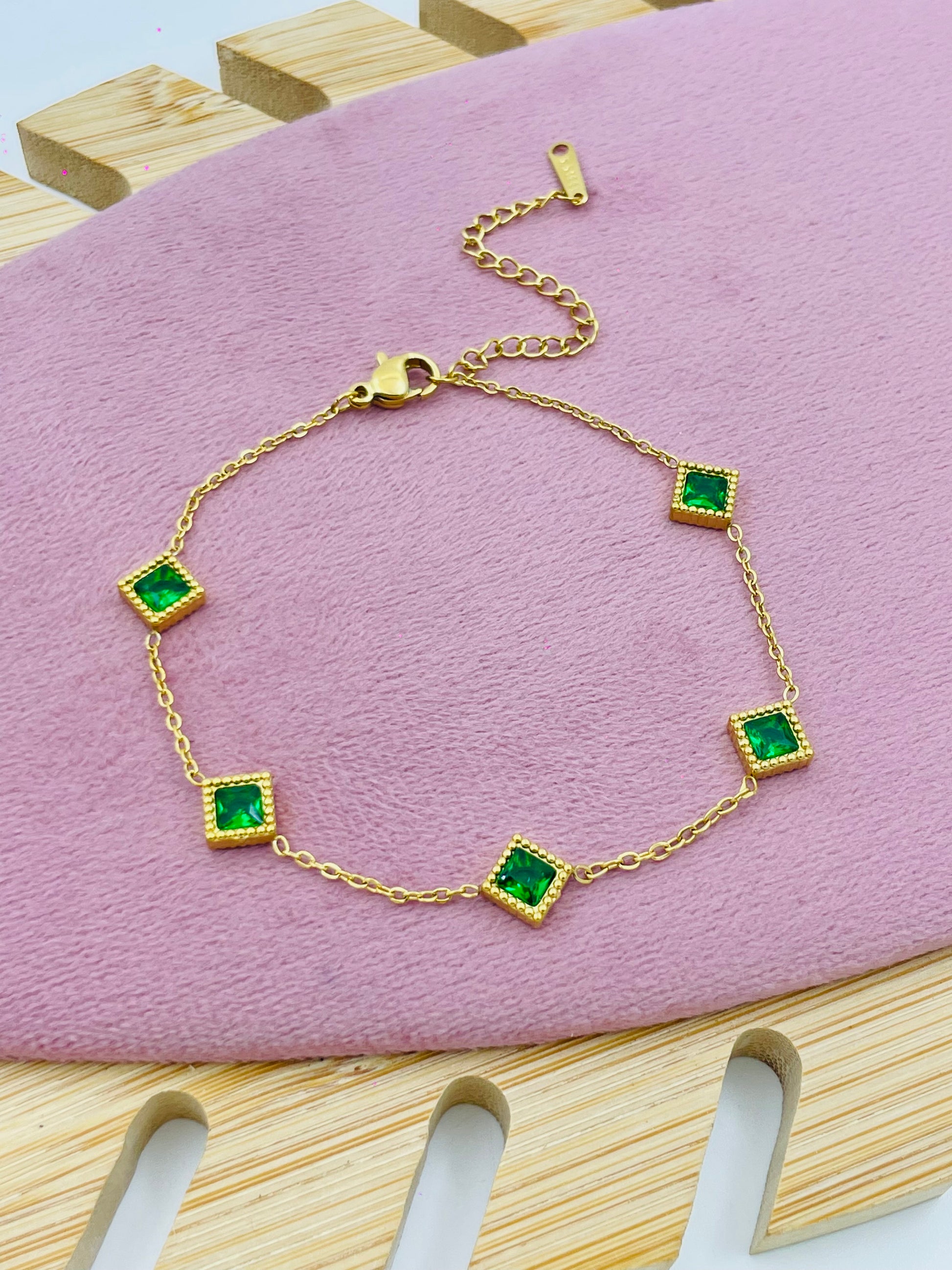 Elegant Gold Bracelet with Green Gemstones