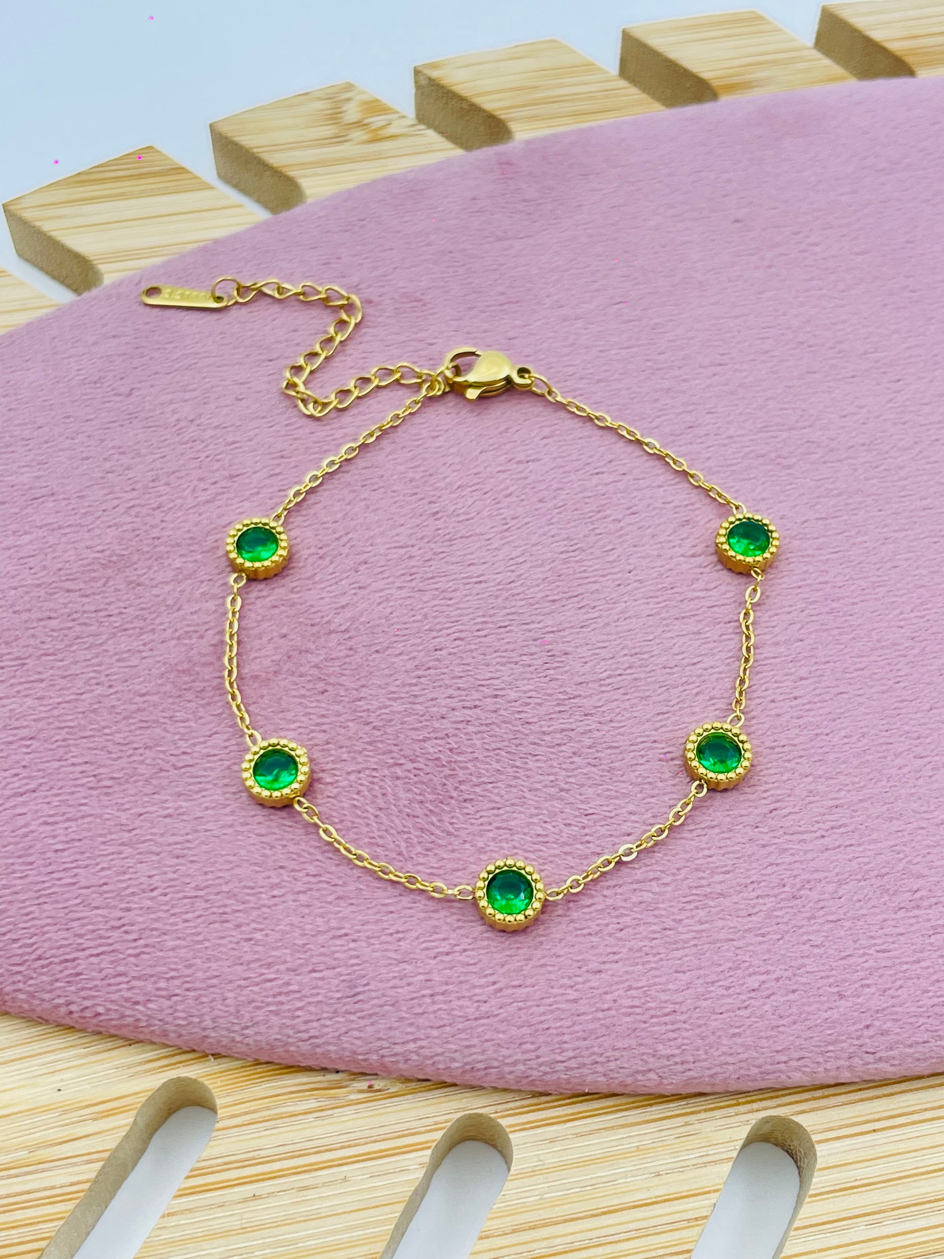 Elegant Gold Bracelet with Green Gemstones