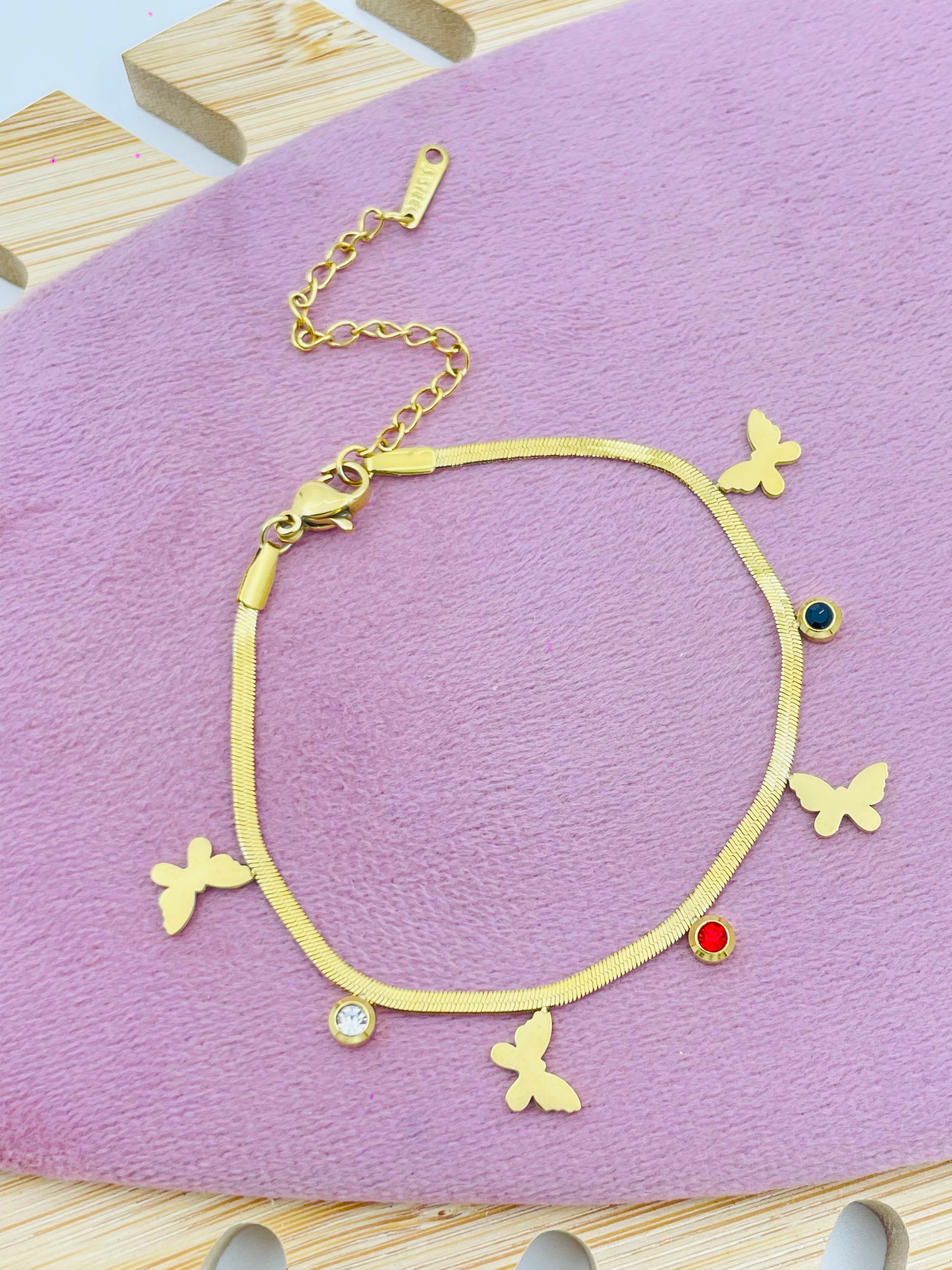Elegant Gold Butterfly Charm Bracelet with Colorful Accents