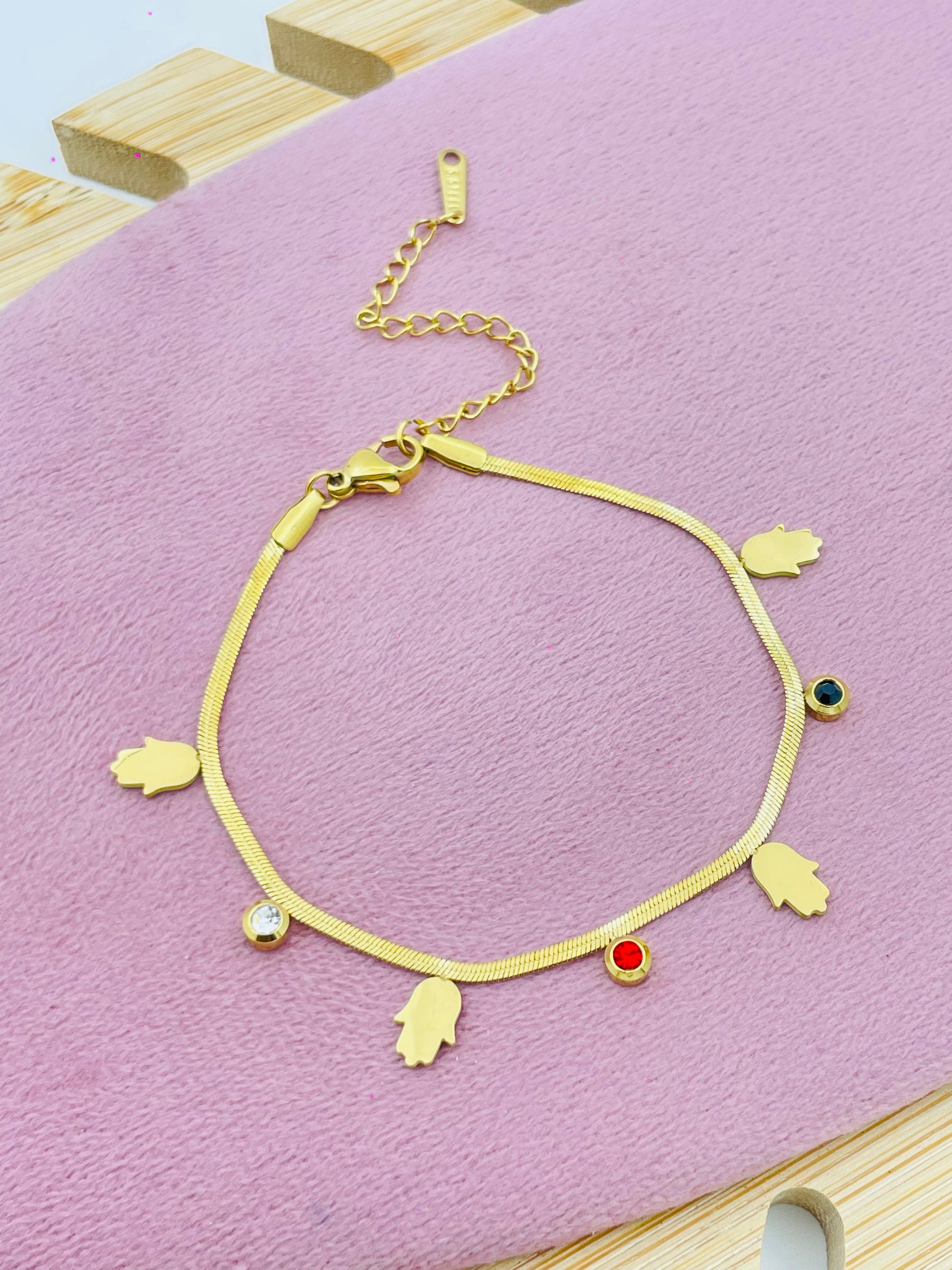 Elegant Gold Charm Bracelet with Colorful Gemstones