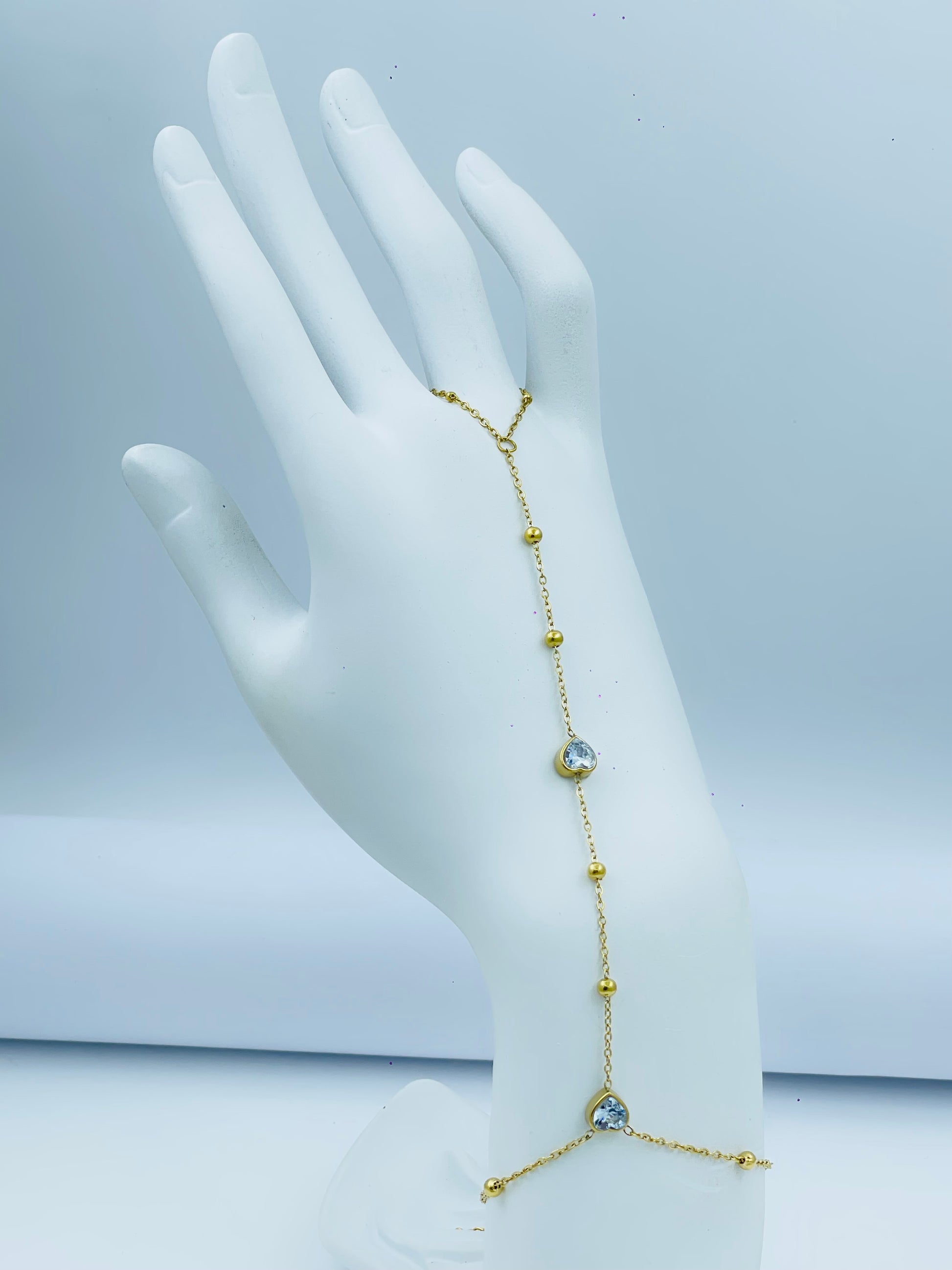 Elegant Gold Hand Chain Bracelet with Blue Accents