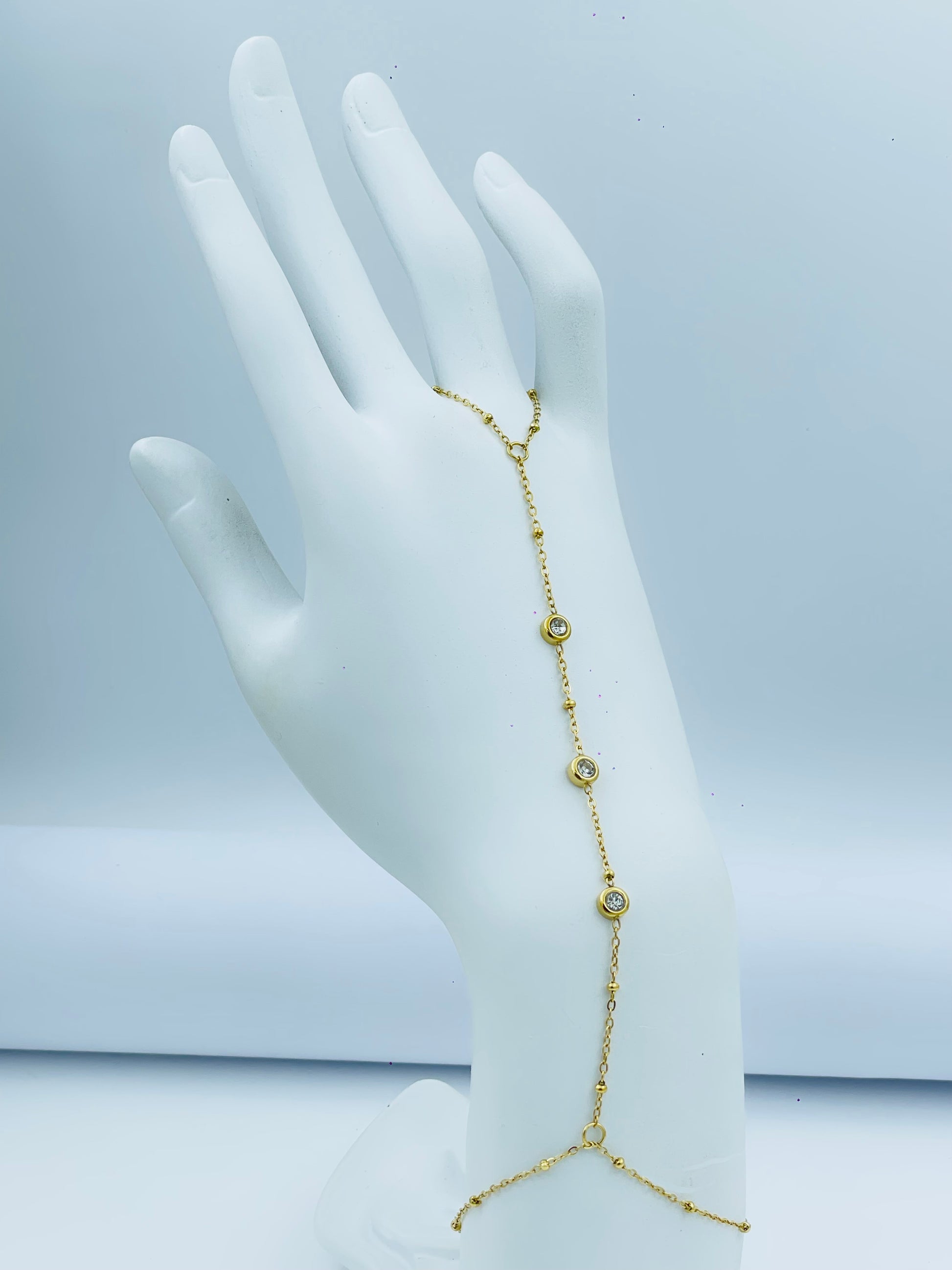 Elegant Gold Hand Chain with Sparkling Gemstones