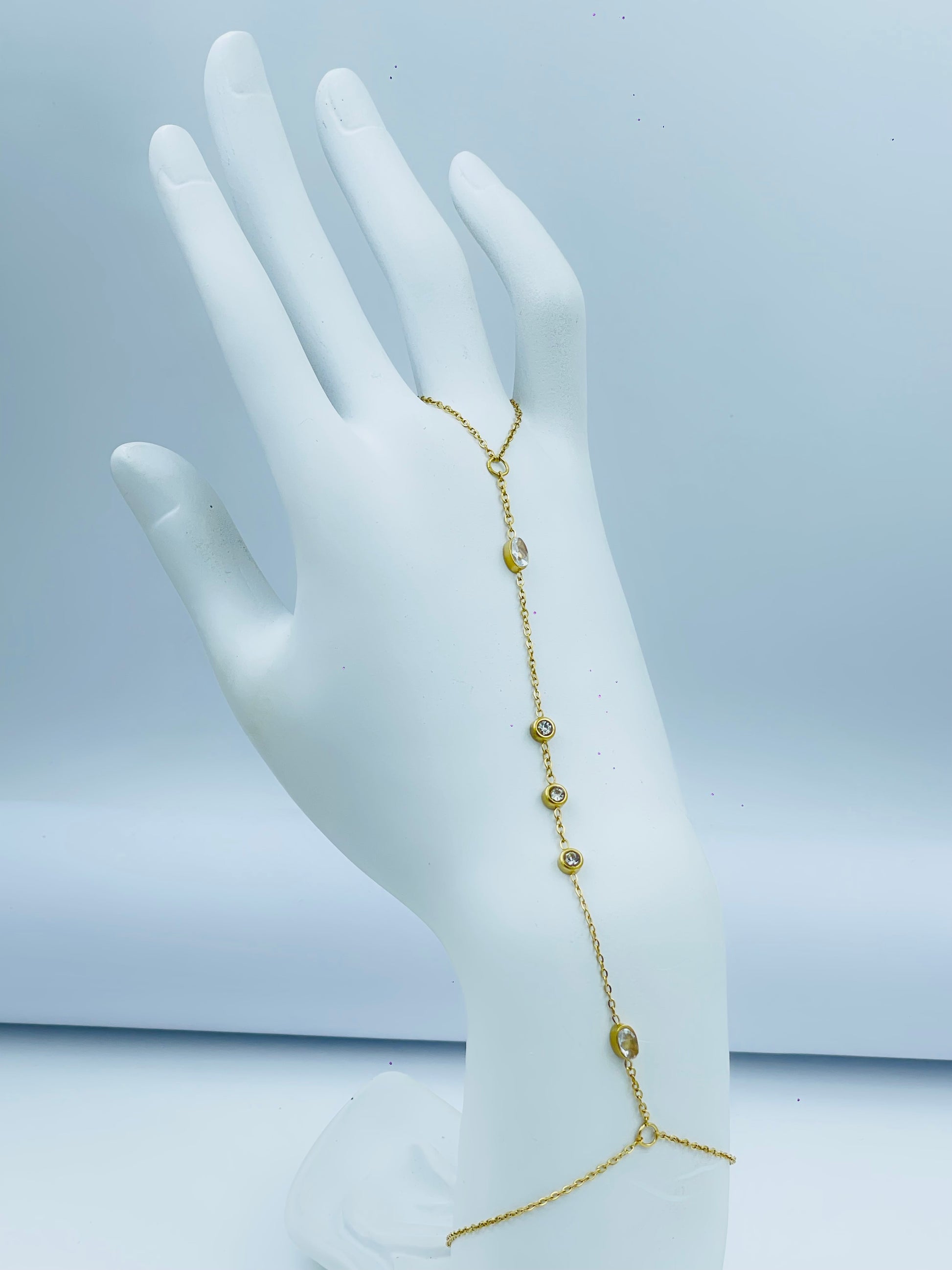 Elegant Gold Hand Chain Bracelet with Gems