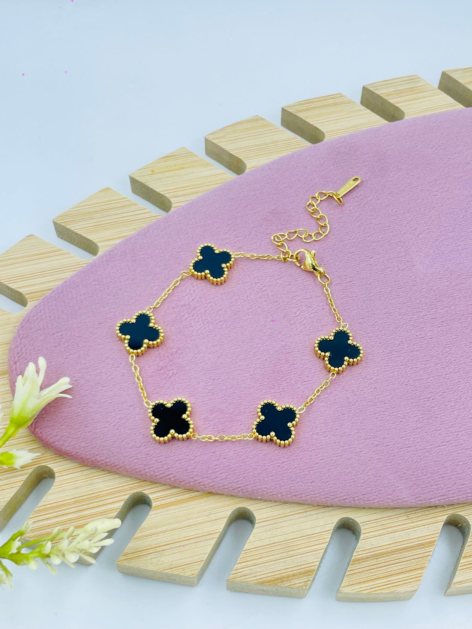 Elegant Black GoldPlated Clover Charm Bracelet